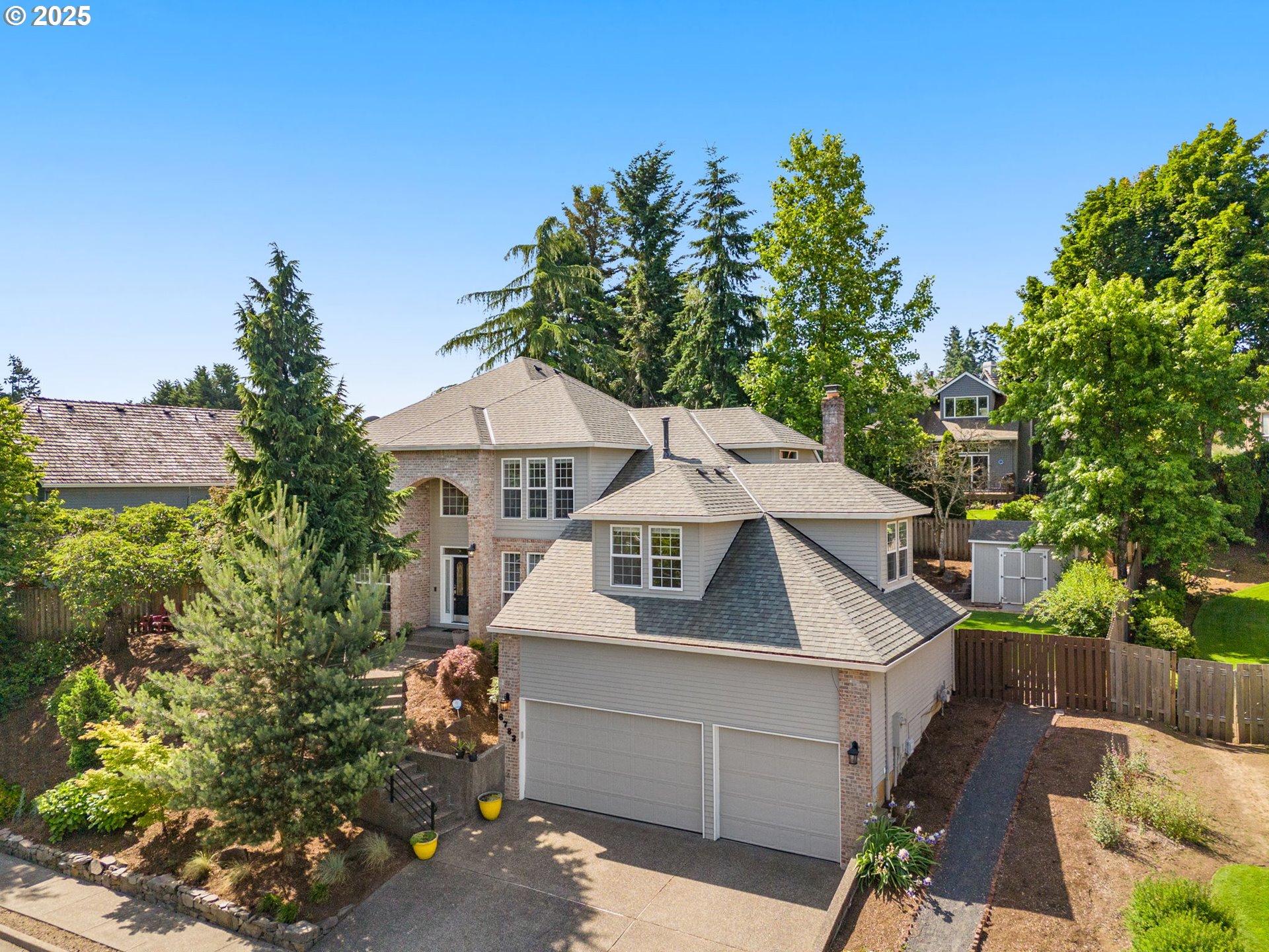 6783 Apollo Road West Linn, OR 97068 - Photo 2 of 42 a aerial view of a house with a yard