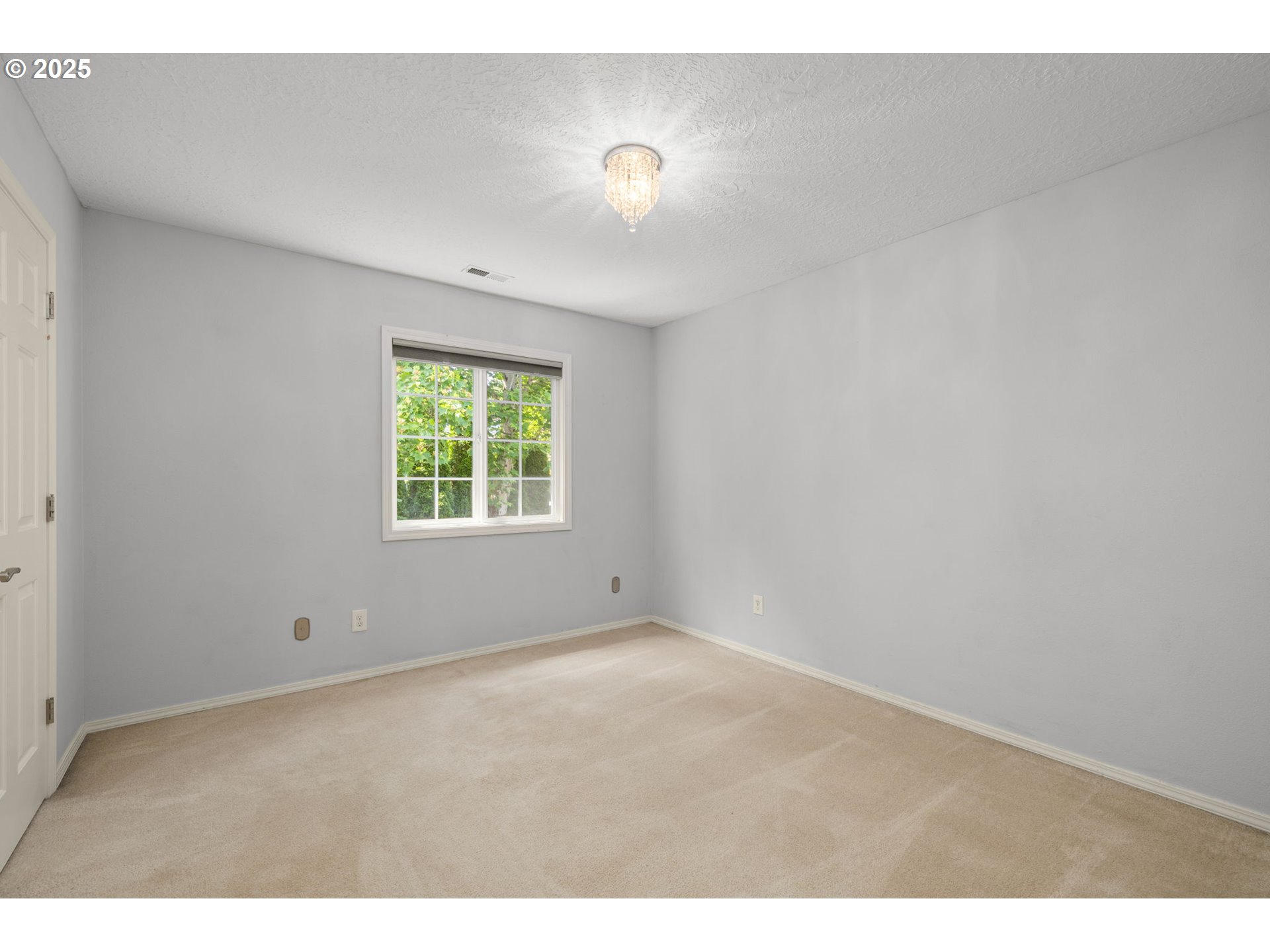 6783 Apollo Road West Linn, OR 97068 - Photo 25 of 42 a view of an empty room with a window