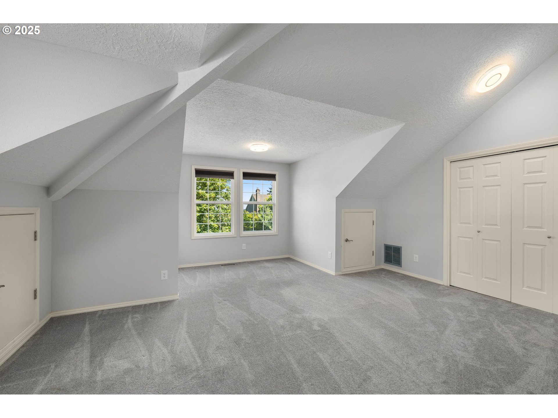 6783 Apollo Road West Linn, OR 97068 - Photo 30 of 42 a view of an empty room with a window