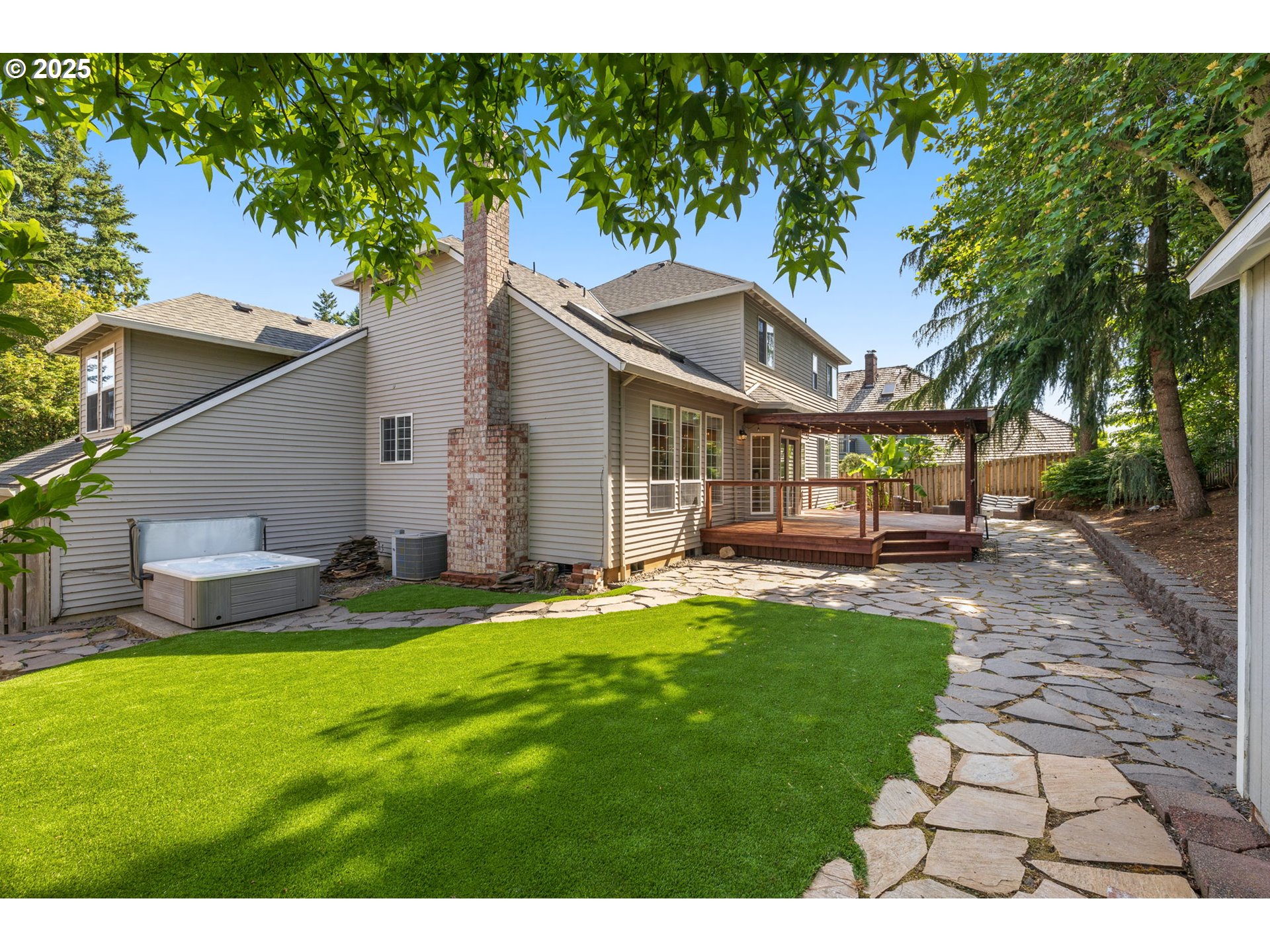 6783 Apollo Road West Linn, OR 97068 - Photo 32 of 42 a view of a house with a yard porch and sitting area