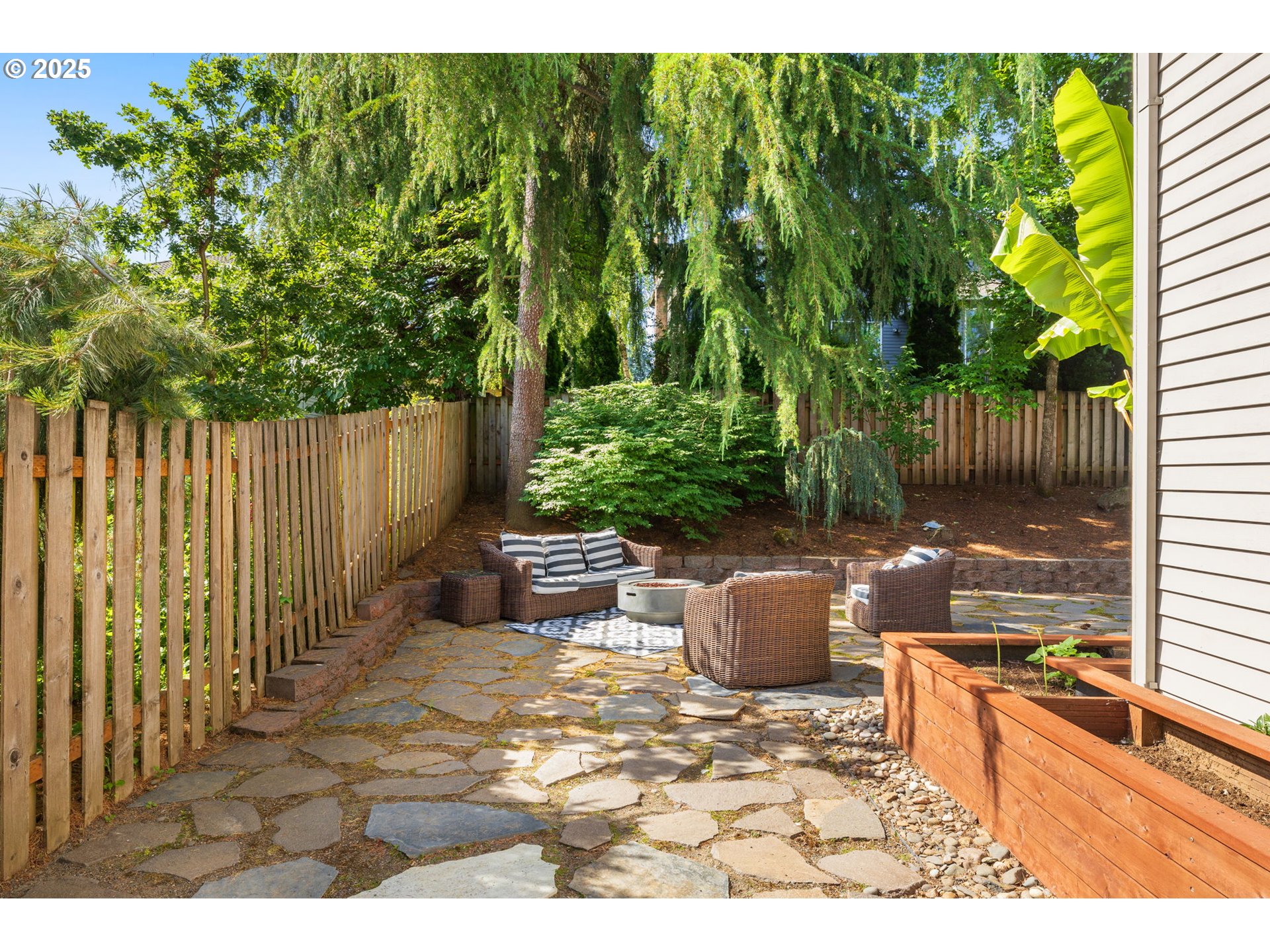 6783 Apollo Road West Linn, OR 97068 - Photo 36 of 42 a view of a backyard with sitting area