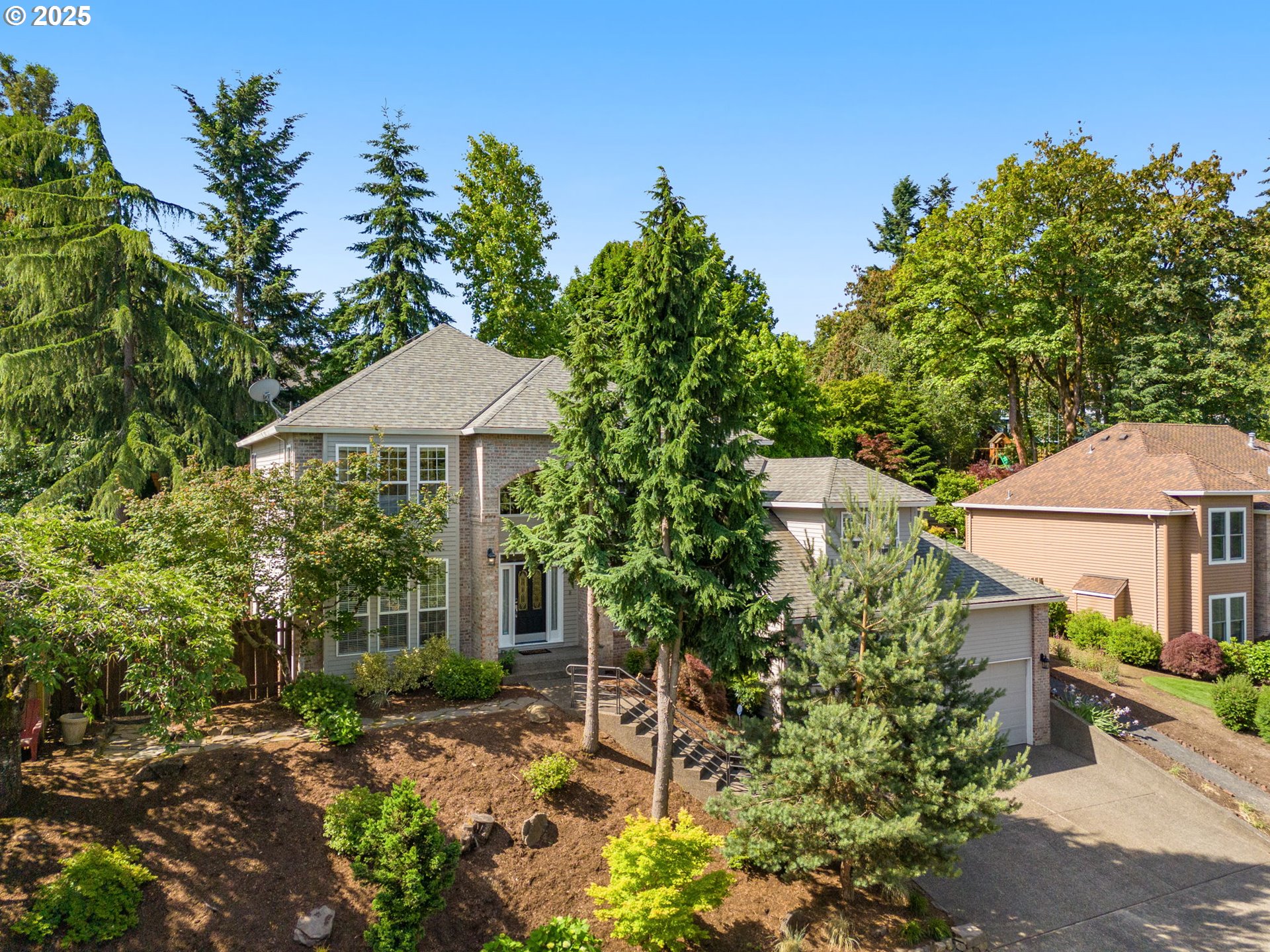 6783 Apollo Road West Linn, OR 97068 - Photo 42 of 42 a view of a chair and table and potted plants in the middle