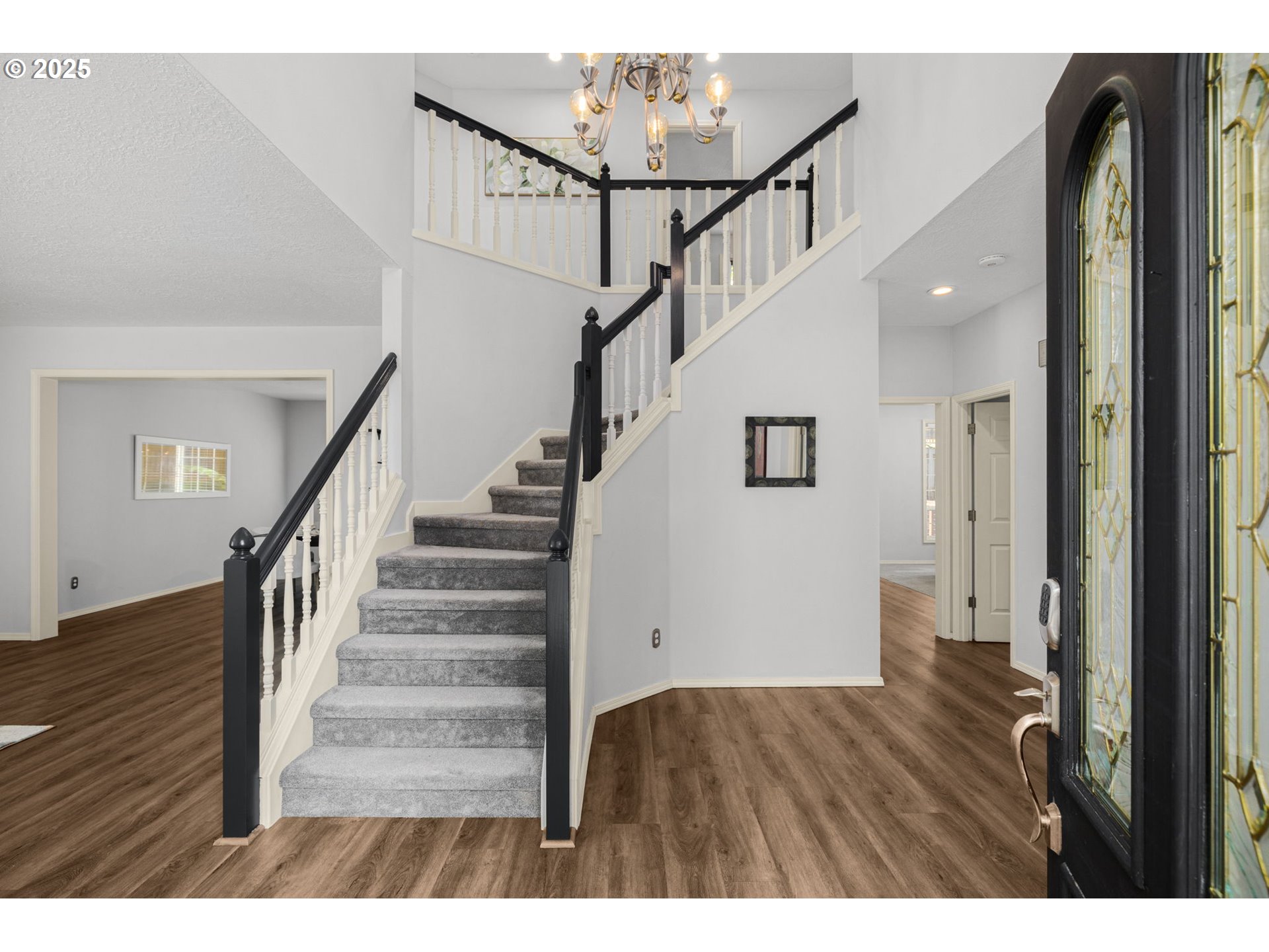 6783 Apollo Road West Linn, OR 97068 - Photo 5 of 42 a view of entryway with wooden floor and stairs