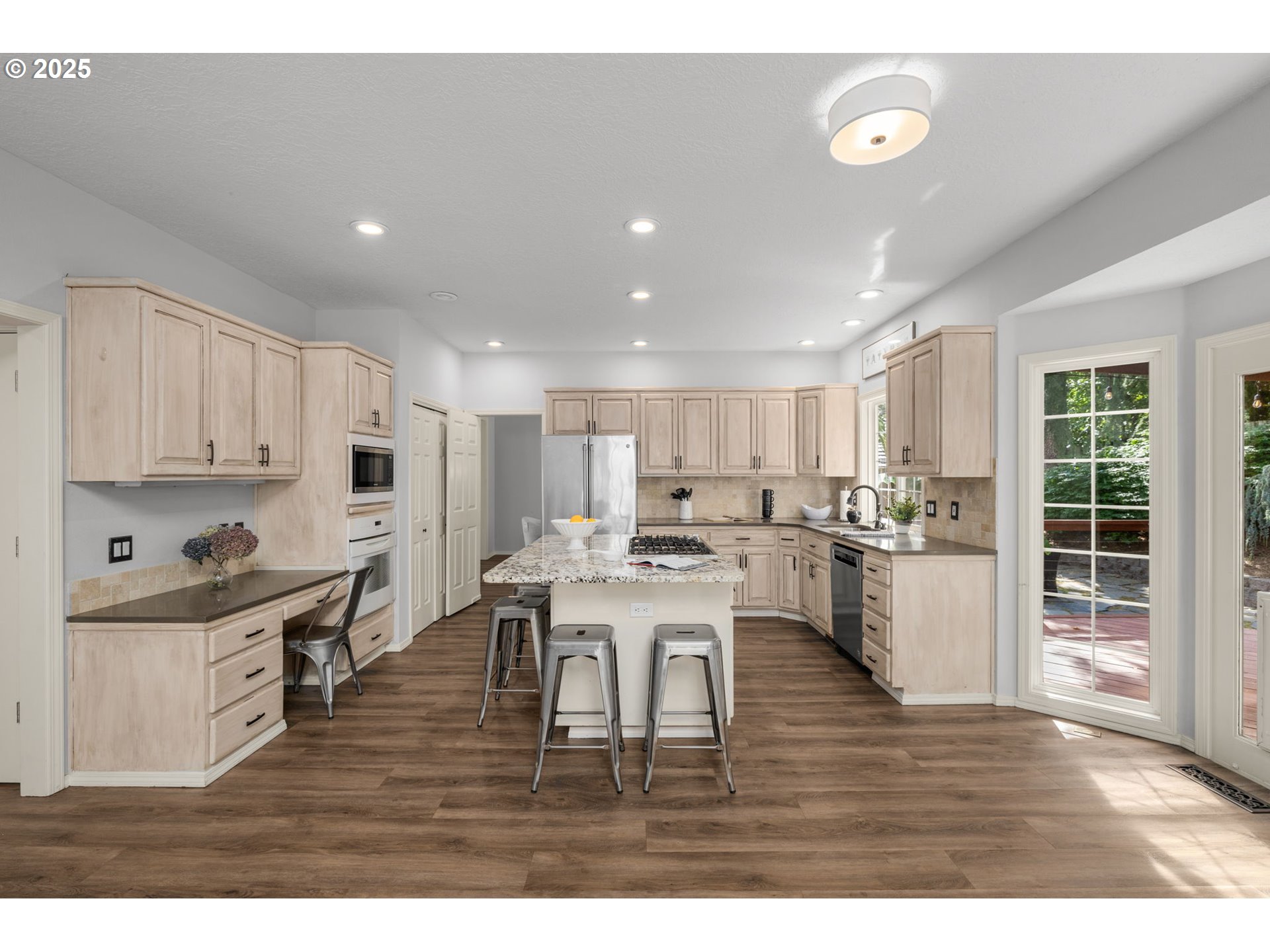 6783 Apollo Road West Linn, OR 97068 - Photo 9 of 42 a living room with lots of furniture and kitchen view