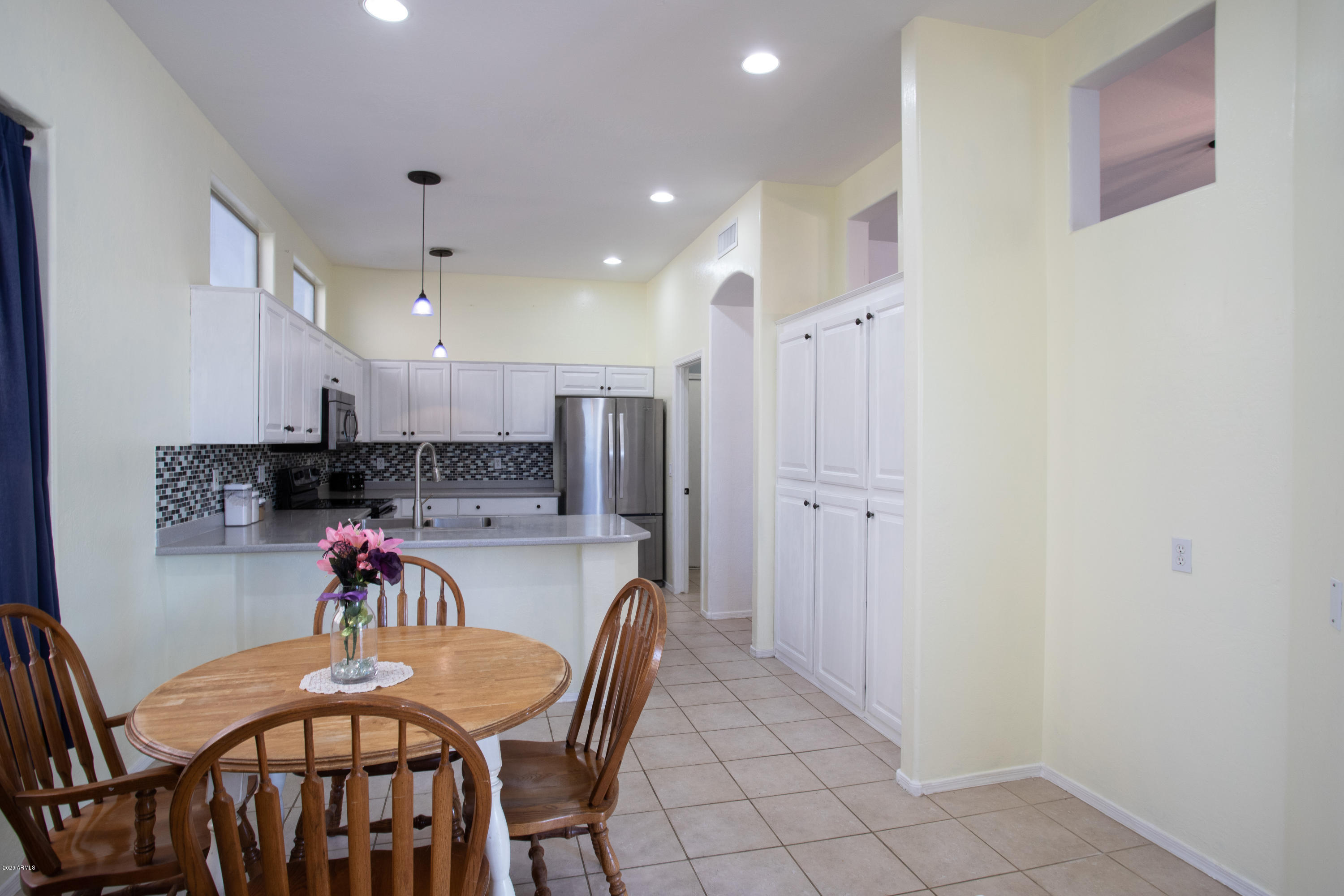 17537 West Wandering Creek Road Goodyear, AZ 85338 - Photo 3 of 8 Nice size eat-in kitchen