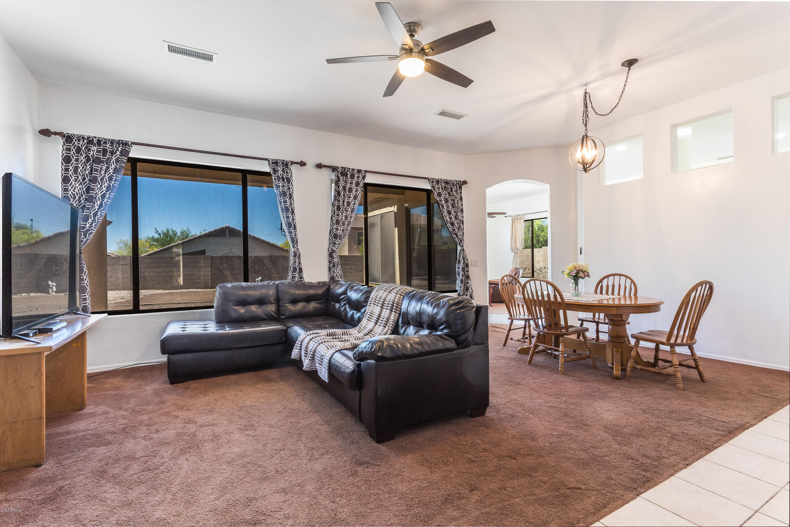 17537 West Wandering Creek Road Goodyear, AZ 85338 - Photo 4 of 8 Carpet is no longer brown!