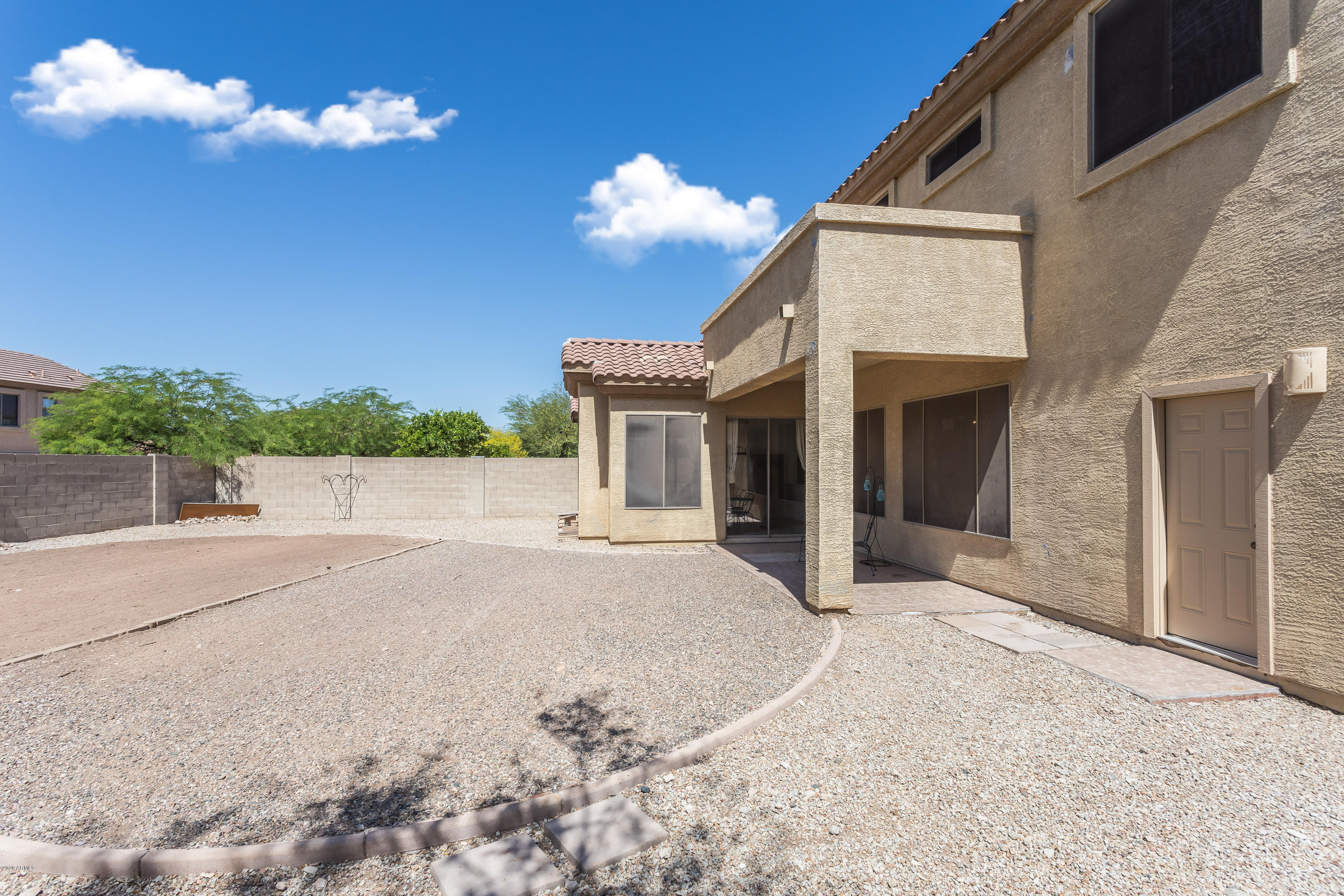 17537 West Wandering Creek Road Goodyear, AZ 85338 - Photo 7 of 8 Current landscaping
