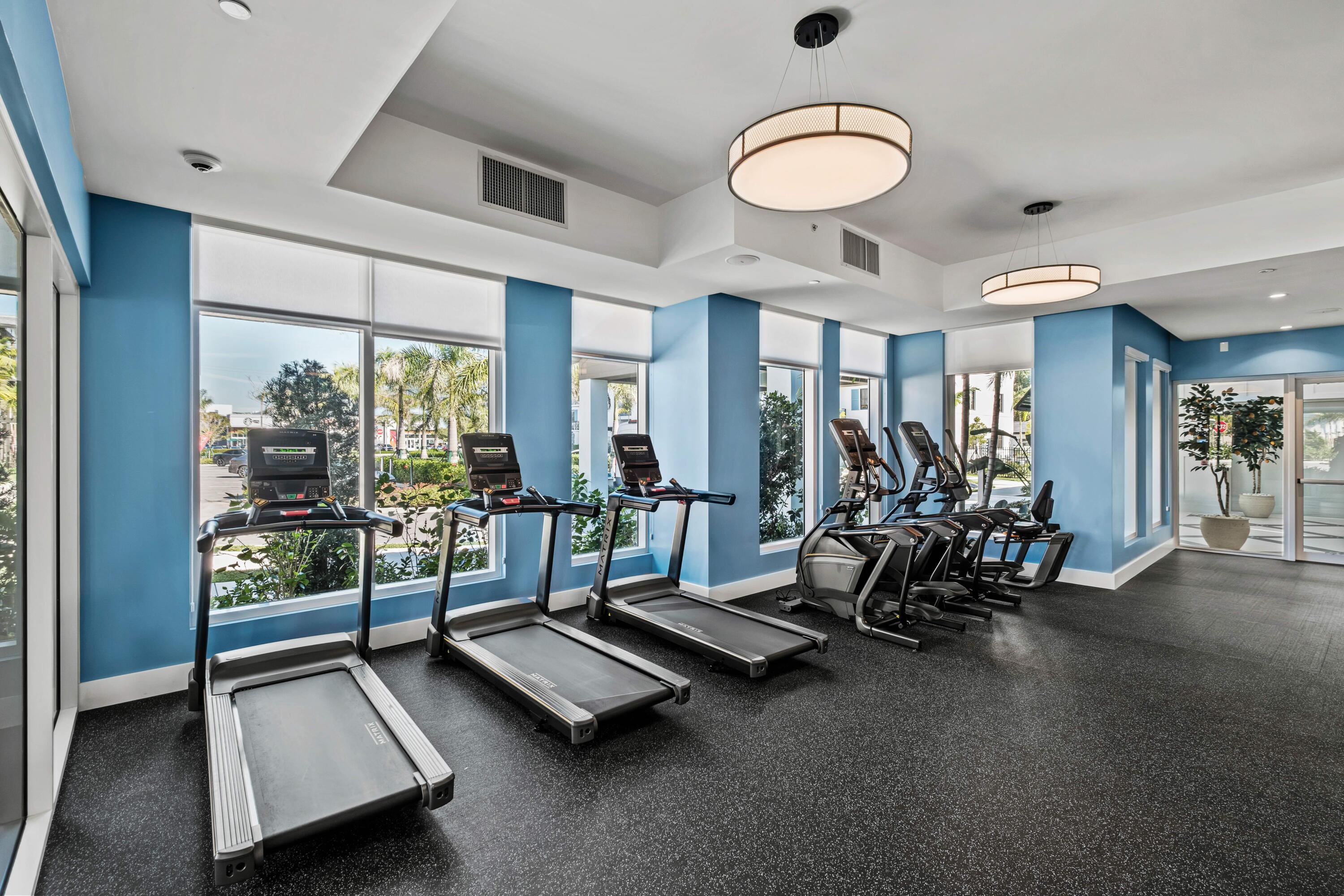 2000 Stirling Road, Unit 14103 Hollywood, FL 33020 - Photo 31 of 35 a view of a room with gym equipment