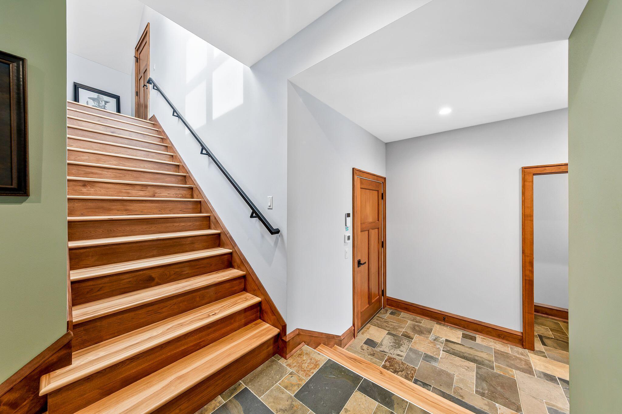 802 East Silver Spring Drive Whitefish Bay, WI 53217 - Photo 39 of 99 BEAUTIFUL STAIRS THAT LEAD TO THE FULL SECOND FLOOR OF THE GARAGE. ENTER FROM THE MUD ROOM