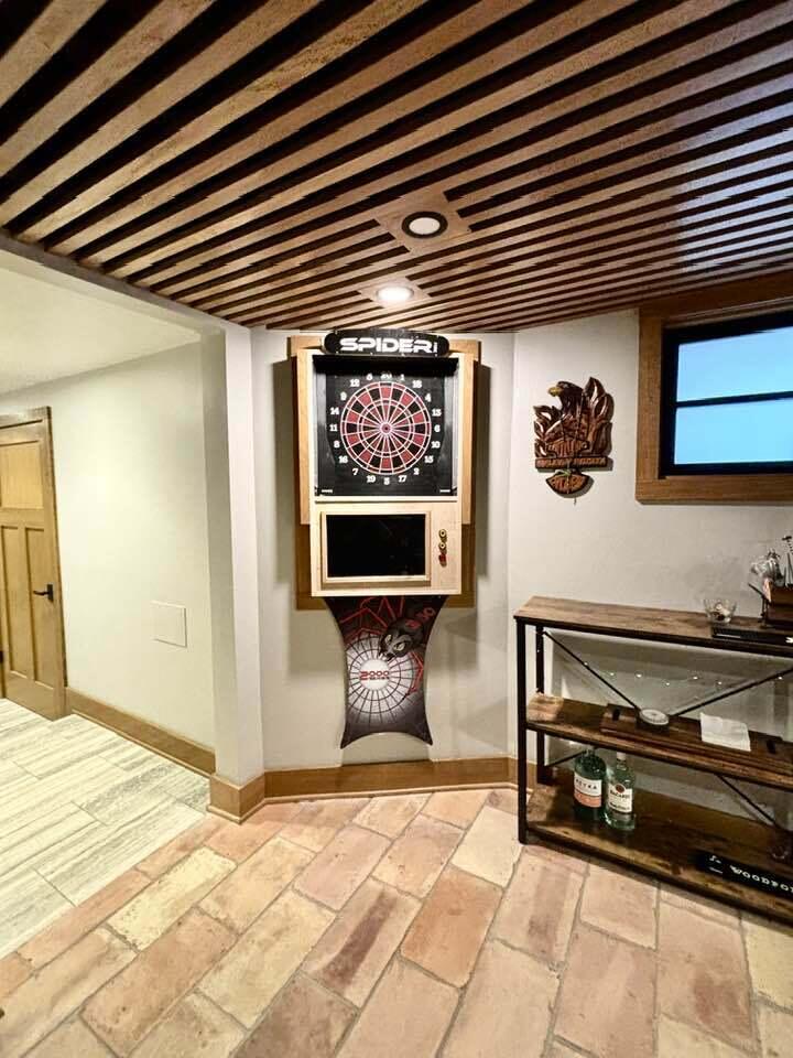 802 East Silver Spring Drive Whitefish Bay, WI 53217 - Photo 53 of 99 THIS REC ROOM BUILT-IN DARTBOARD IS A FIXTURE, AND STAYS WITH THE HOME