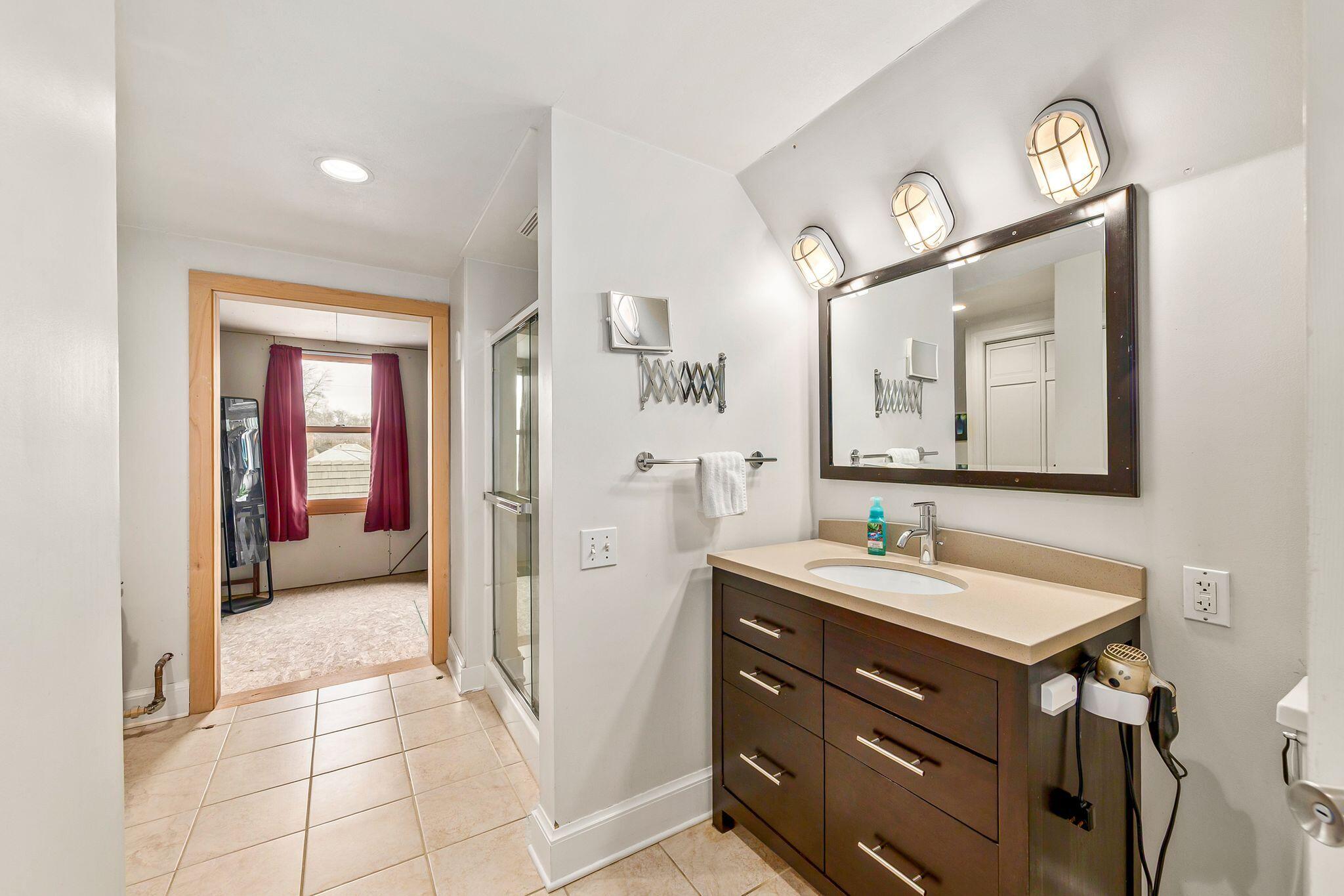 802 East Silver Spring Drive Whitefish Bay, WI 53217 - Photo 61 of 99 BATHROOM IN THE PRIMARY SUITE