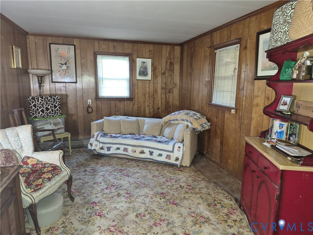 3818 Cedar Grove Road Richmond, VA 23235 - Photo 16 of 20 a living room with furniture and a dresser