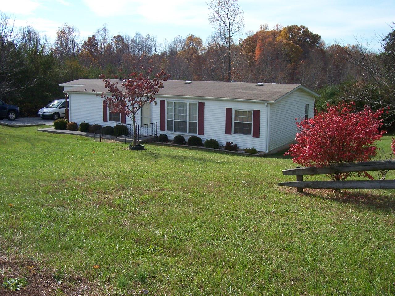 4619 Horseshoe Bend Road Goodview, VA 24095 - Photo 7 of 7 a front view of a house with garden
