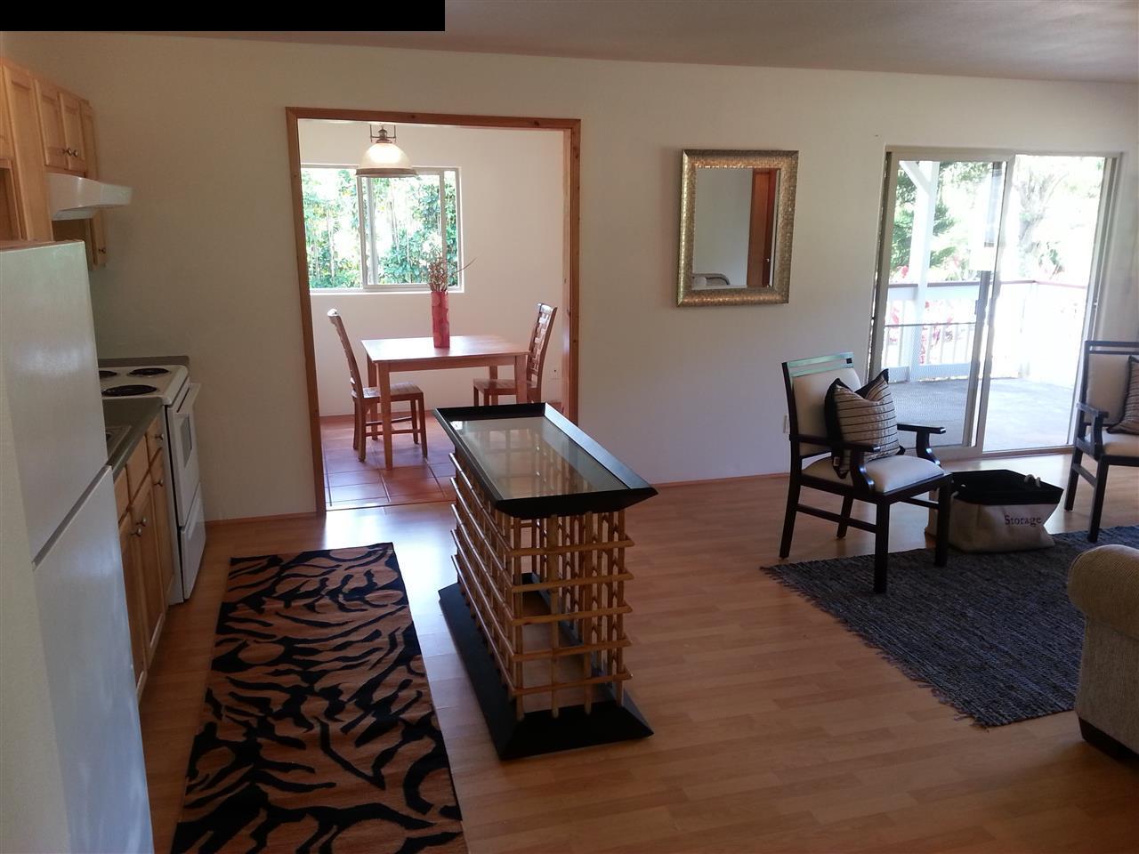 1450 Kauhikoa Road Haiku, HI 96708 - Photo 19 of 30 a living room with furniture and a window