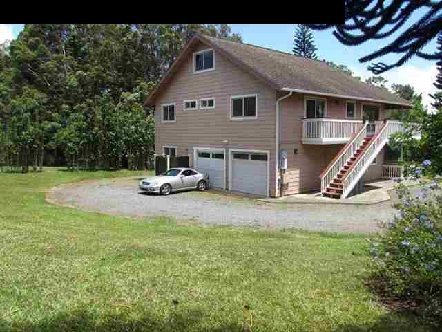 1450 Kauhikoa Road Haiku, HI 96708 - Photo 3 of 30 a house view with a garden space