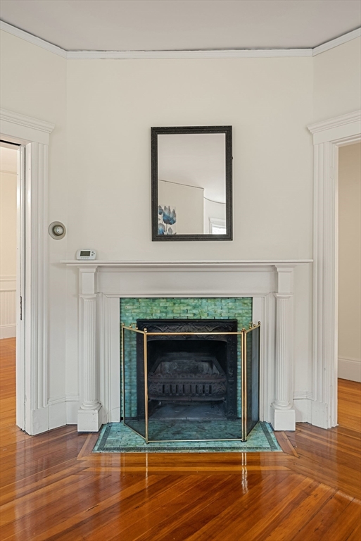 179 Rawson Road, Unit 2 Brookline, MA 02445 - Photo 12 of 42 a living room with a fireplace