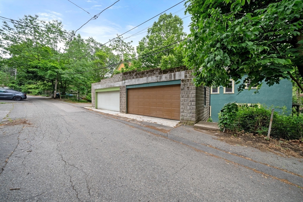 179 Rawson Road, Unit 2 Brookline, MA 02445 - Photo 41 of 42 a view of a house with a outdoor space