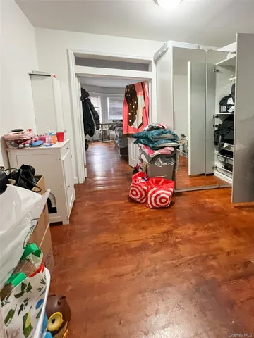 a bedroom with furniture and a bed