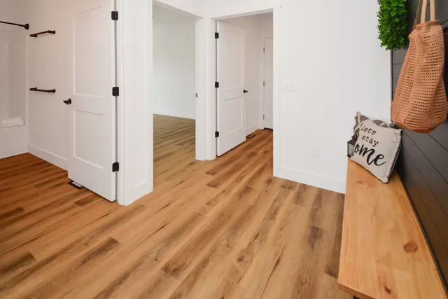 a bedroom with a bed and a view of bedroom