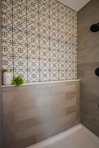 a bathroom with a sink a toilet and mirror