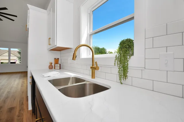 a front view of a house with yard