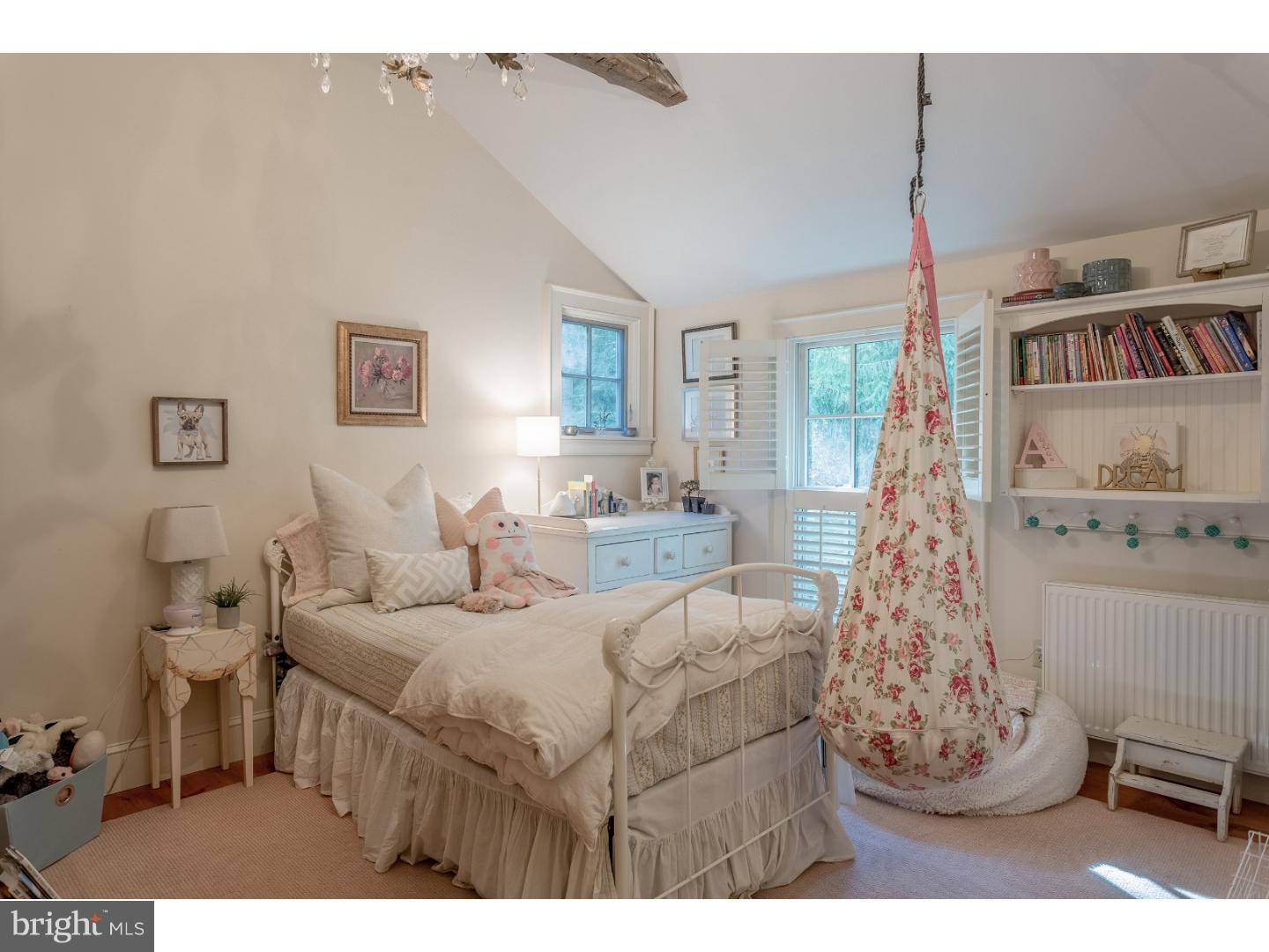 7174 Centerbridge Road New Hope, PA 18938 - Photo 19 of 24 a bedroom with a bed and a window