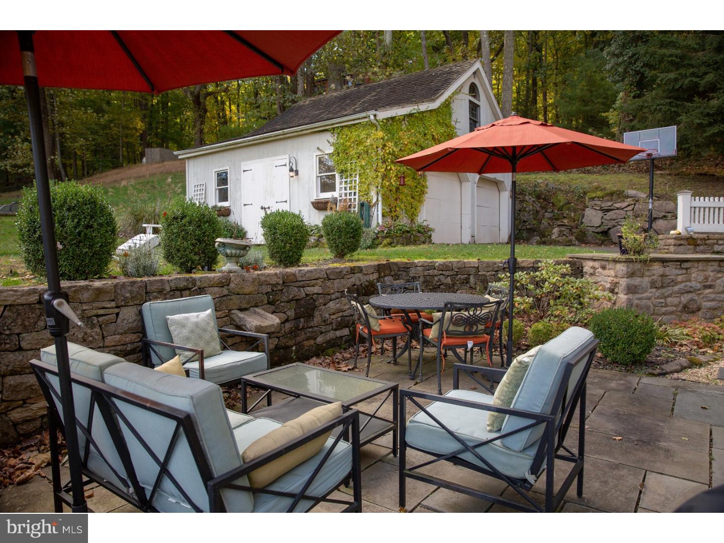 7174 Centerbridge Road New Hope, PA 18938 - Photo 21 of 24 a view of a patio with chairs and wooden floor