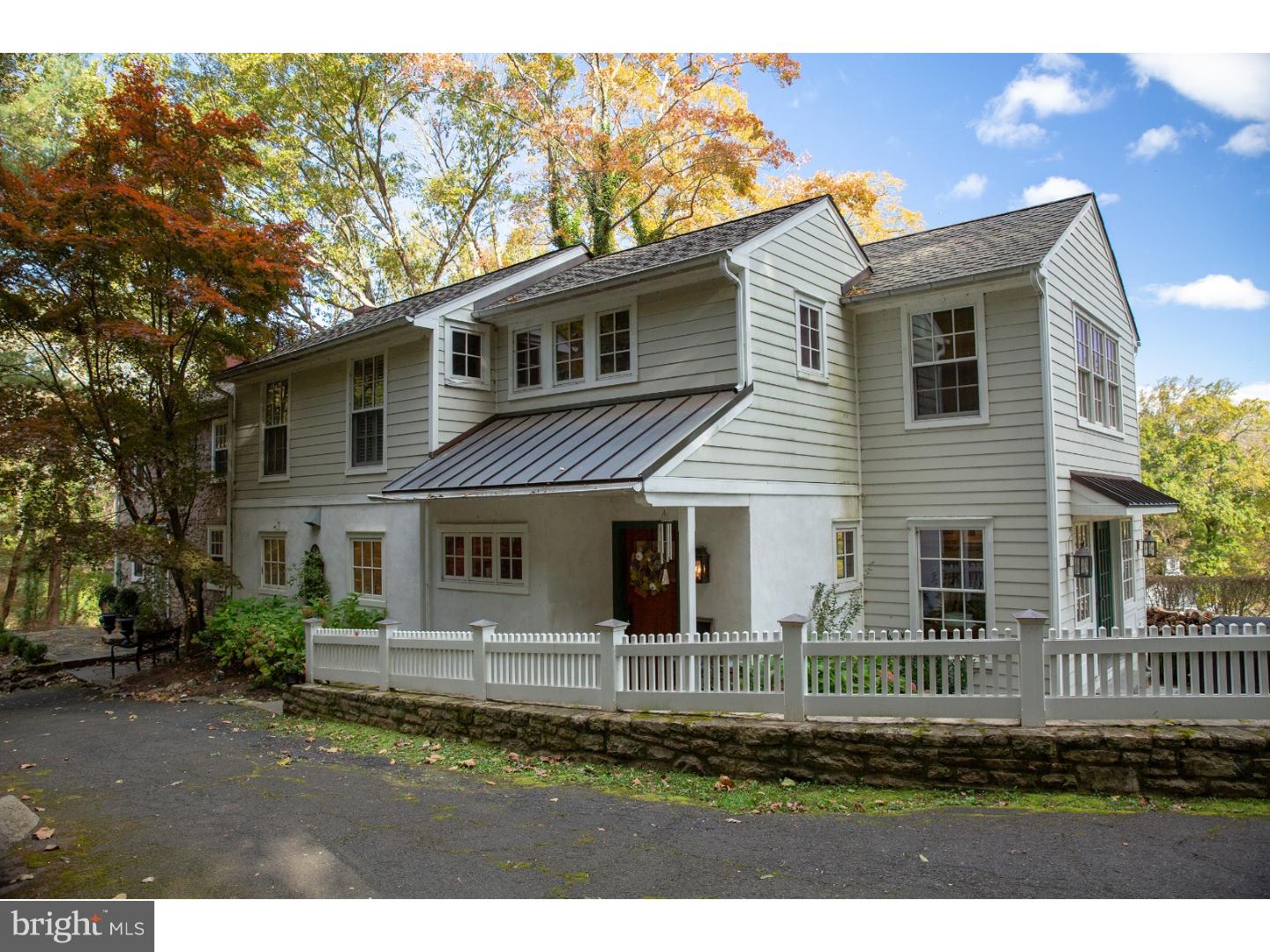 7174 Centerbridge Road New Hope, PA 18938 - Photo 22 of 24 a front view of a house with a yard