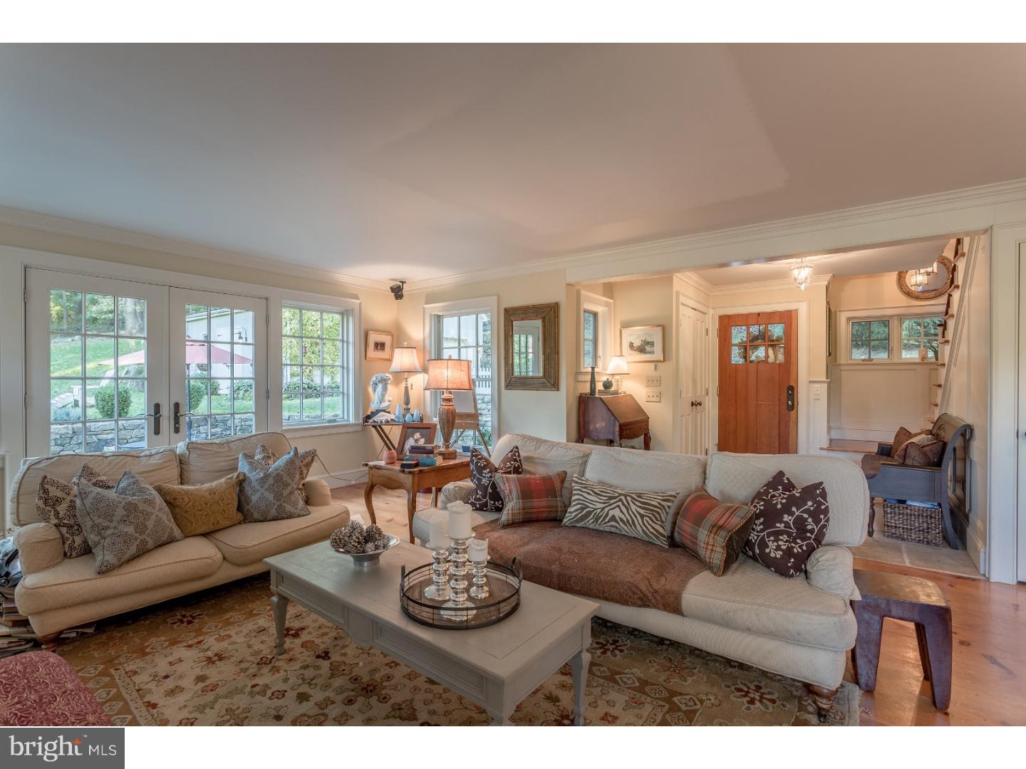 7174 Centerbridge Road New Hope, PA 18938 - Photo 7 of 24 a living room with furniture and a large window