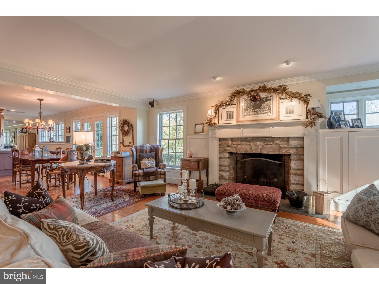7174 Centerbridge Road New Hope, PA 18938 - Photo 8 of 24 a living room with furniture and a fireplace
