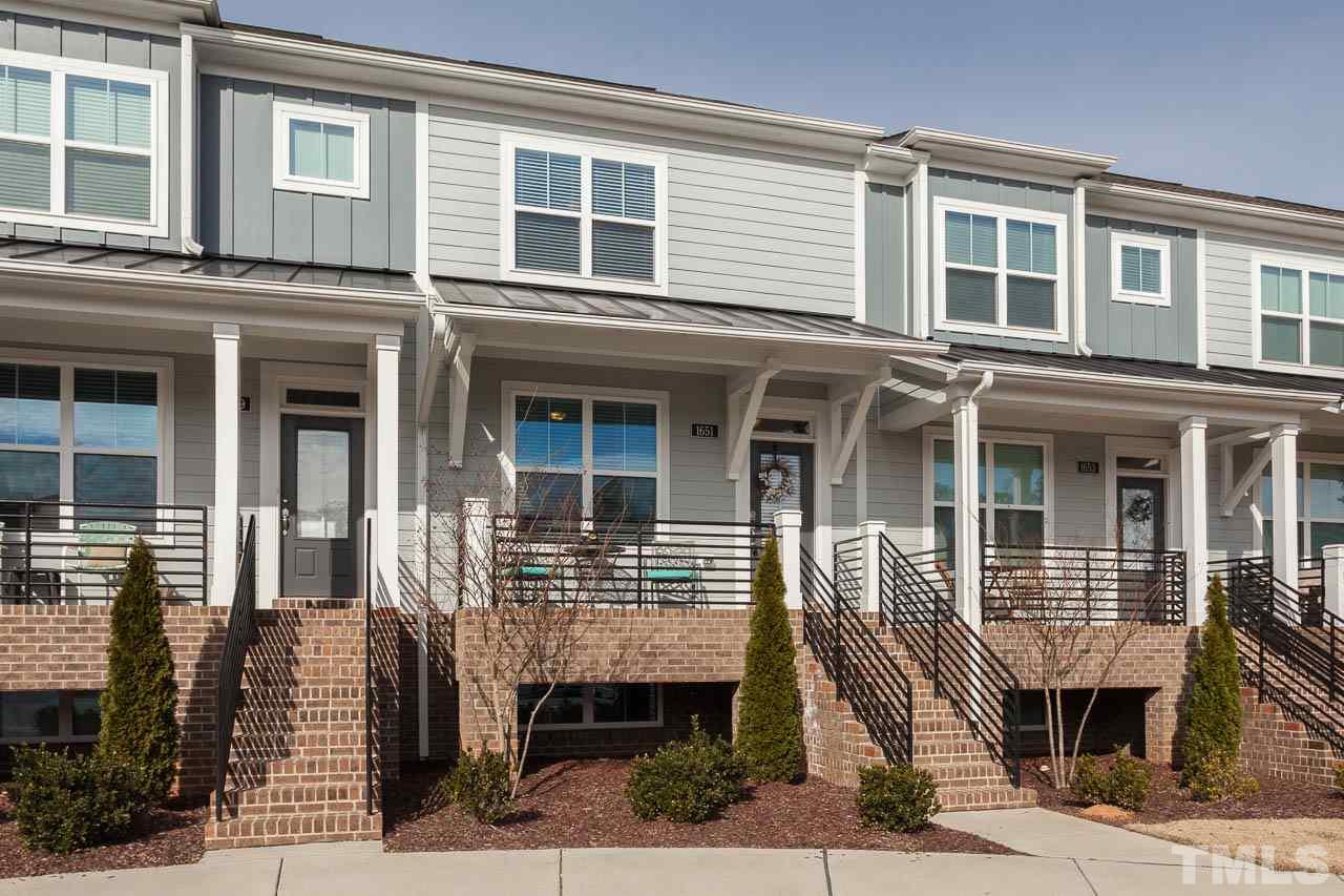1651 Crafton Way Raleigh, NC 27607 - Photo 1 of 20 a front view of a house with many windows