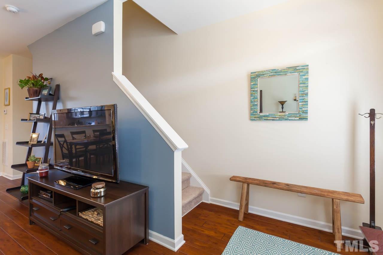 1651 Crafton Way Raleigh, NC 27607 - Photo 4 of 20 a view of an entryway with wooden floor
