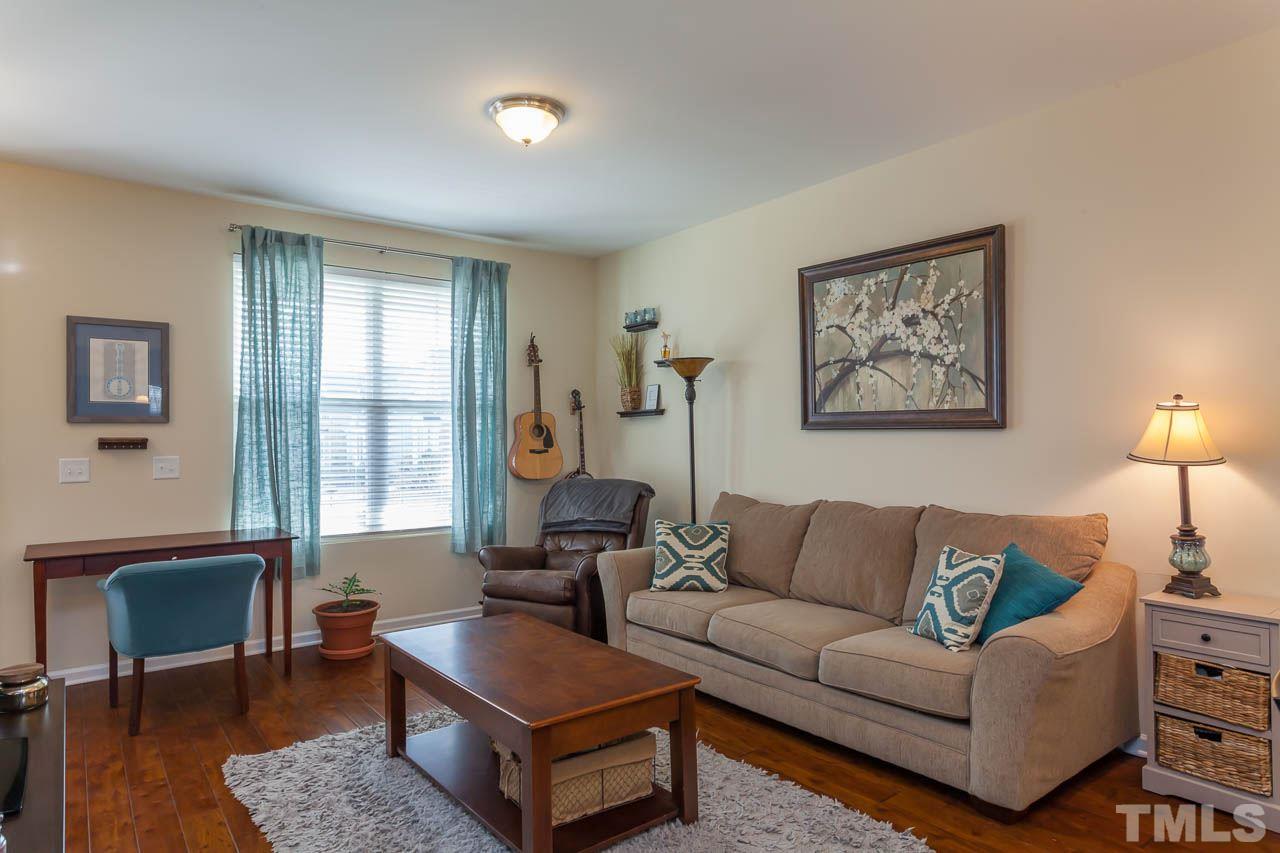 1651 Crafton Way Raleigh, NC 27607 - Photo 6 of 20 a living room with furniture and a window