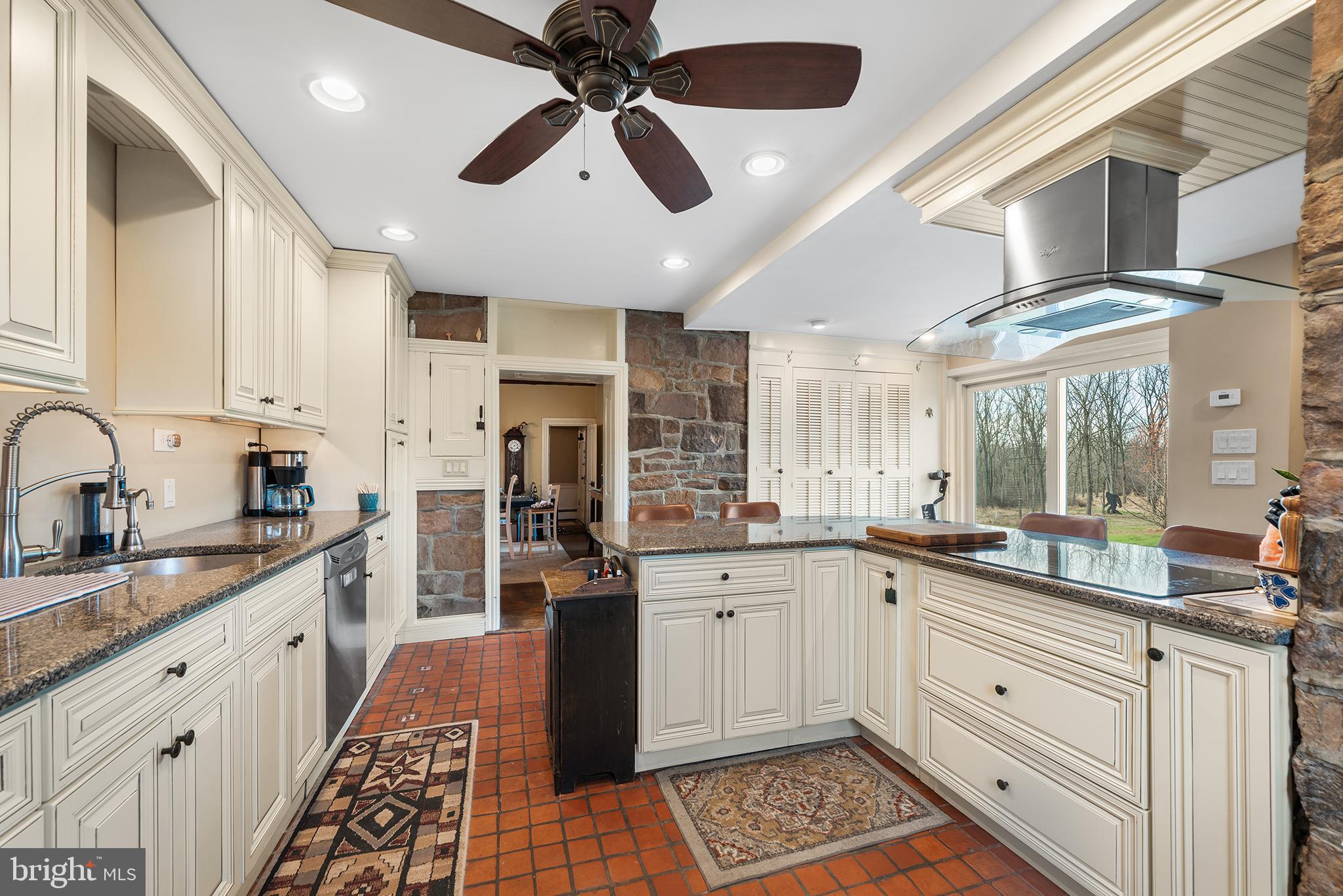 206 Twinbrook Road Perkasie, PA 18944 - Photo 13 of 46 a large white kitchen with a large window