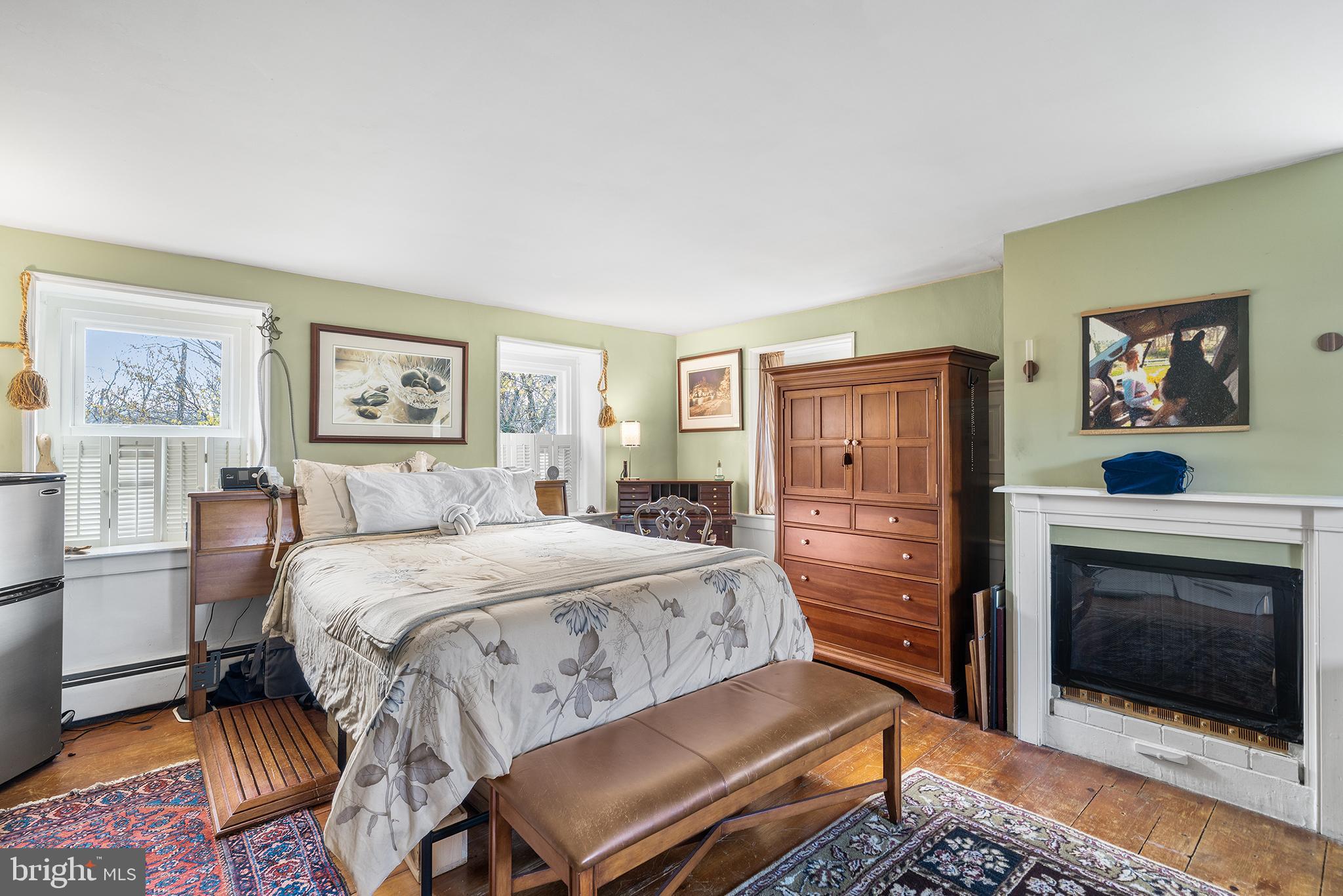 206 Twinbrook Road Perkasie, PA 18944 - Photo 22 of 46 a bedroom with a bed and a dresser