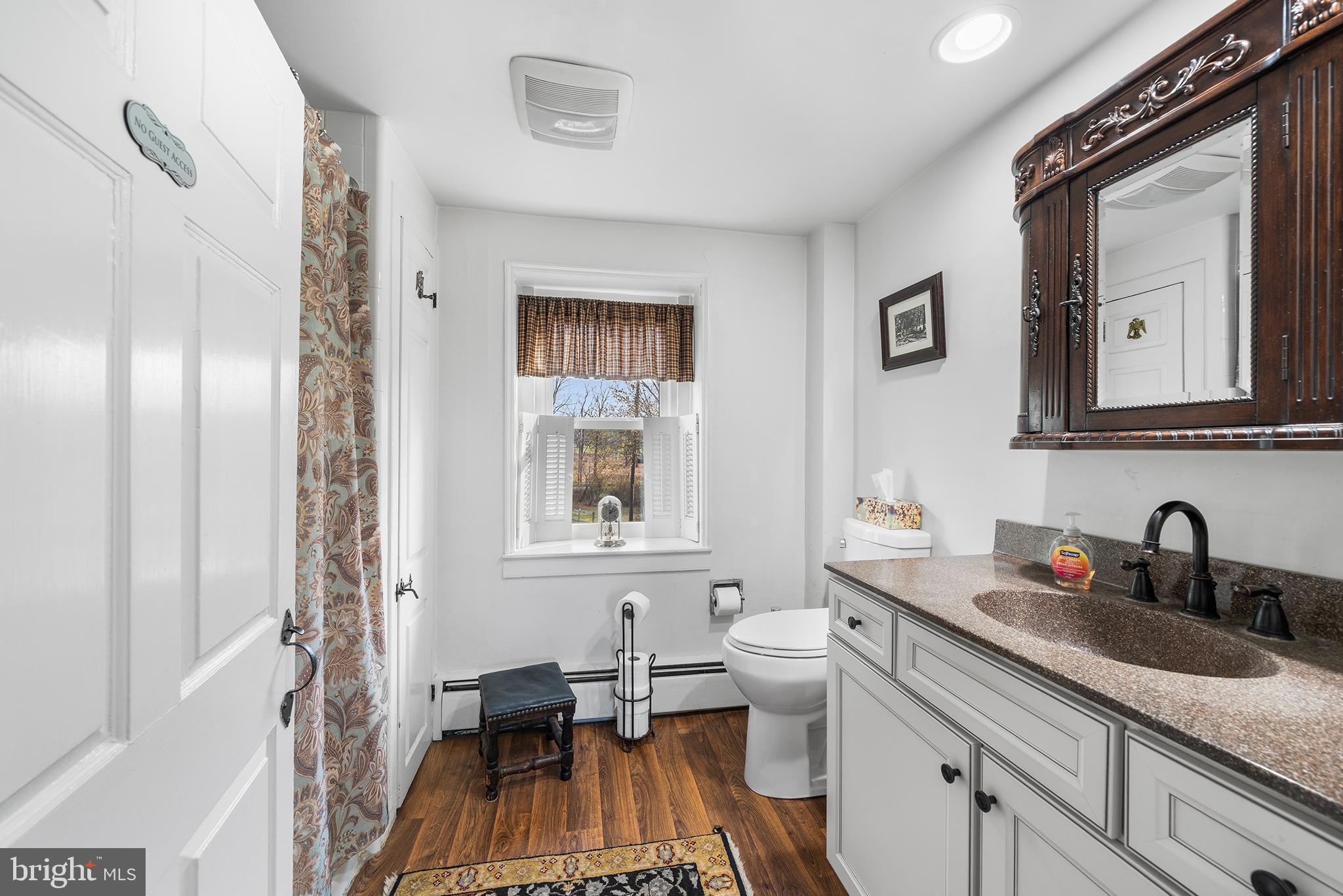 206 Twinbrook Road Perkasie, PA 18944 - Photo 23 of 46 a en suite bathroom with a granite countertop sink and a mirror
