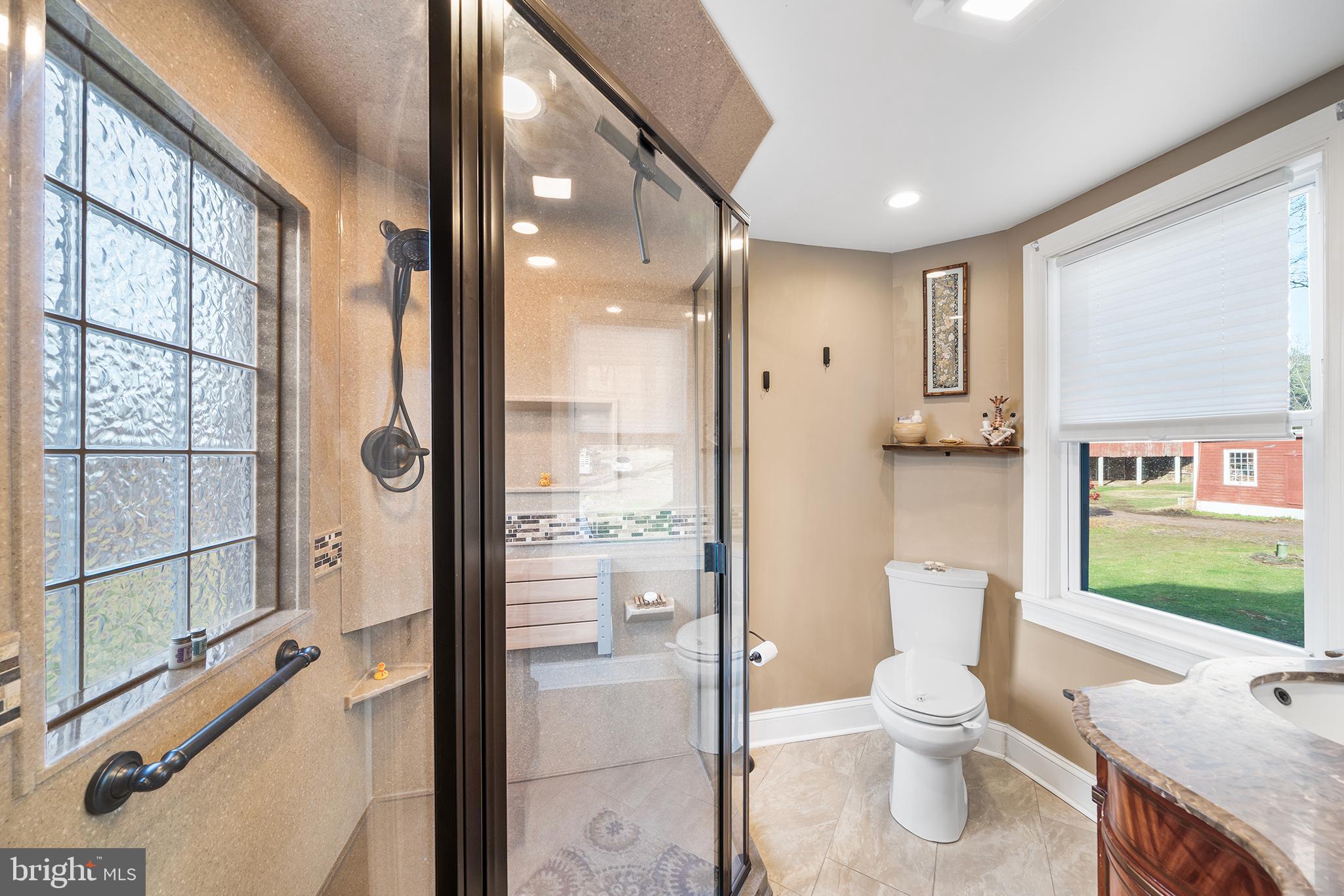 206 Twinbrook Road Perkasie, PA 18944 - Photo 28 of 46 a bathroom with a granite countertop sink mirror and toilet