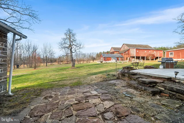 a view of a park with swings and slides