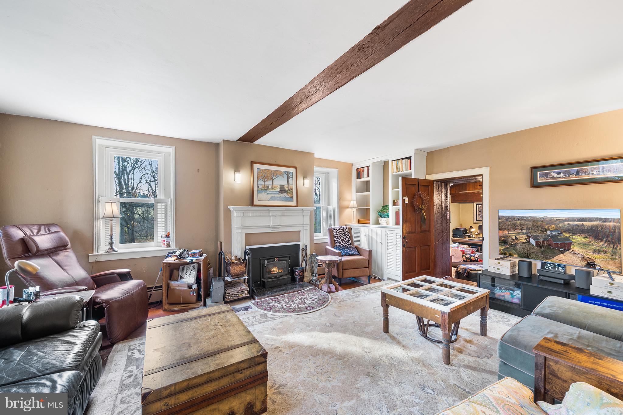 206 Twinbrook Road Perkasie, PA 18944 - Photo 7 of 46 a living room with furniture and a fireplace