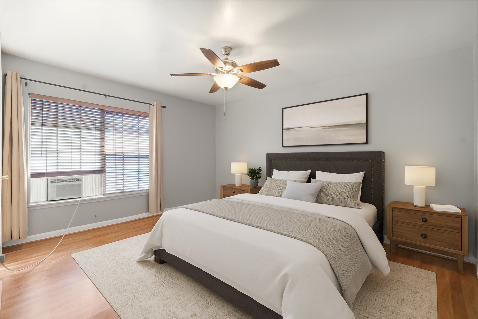 2824 Briarhurst Drive, Unit 14 Houston, TX 77057 - Photo 15 of 26 a bedroom with a bed and a night stand