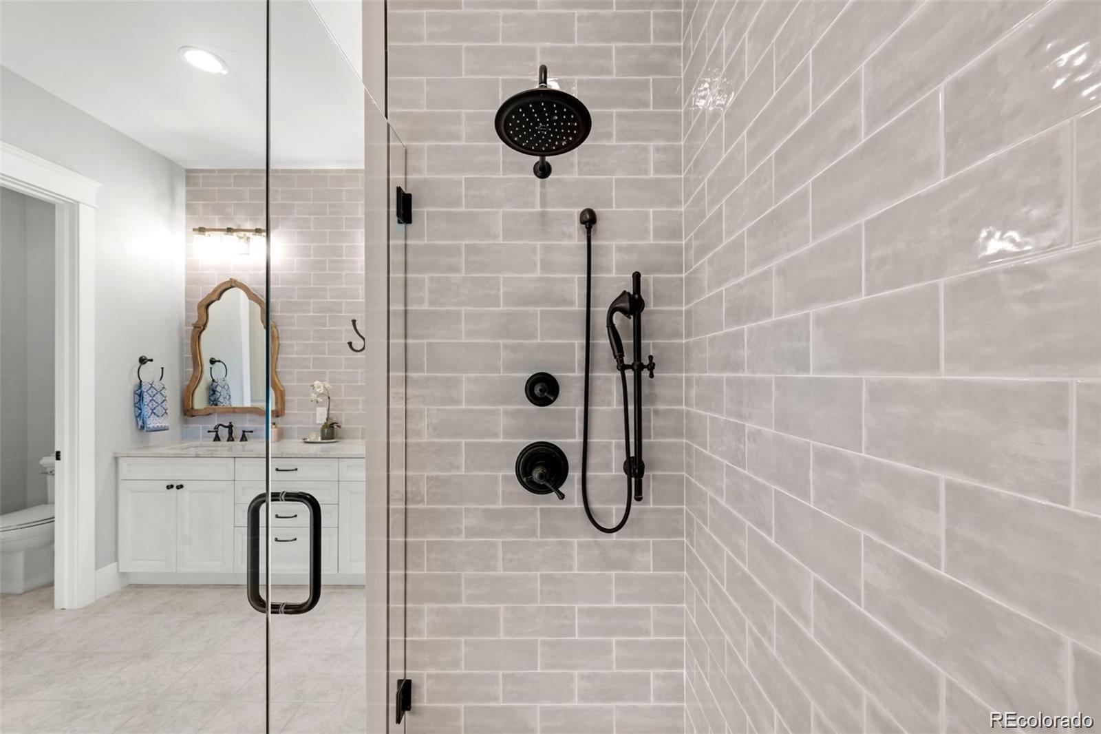 7912 Raphael Lane Littleton, CO 80125 - Photo 25 of 50 a bathroom with a shower