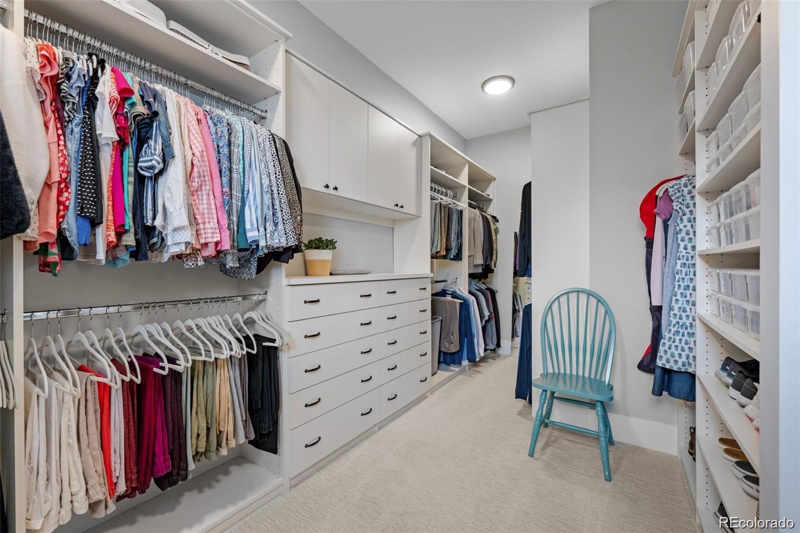 7912 Raphael Lane Littleton, CO 80125 - Photo 26 of 50 a view of walk in closet with clothes