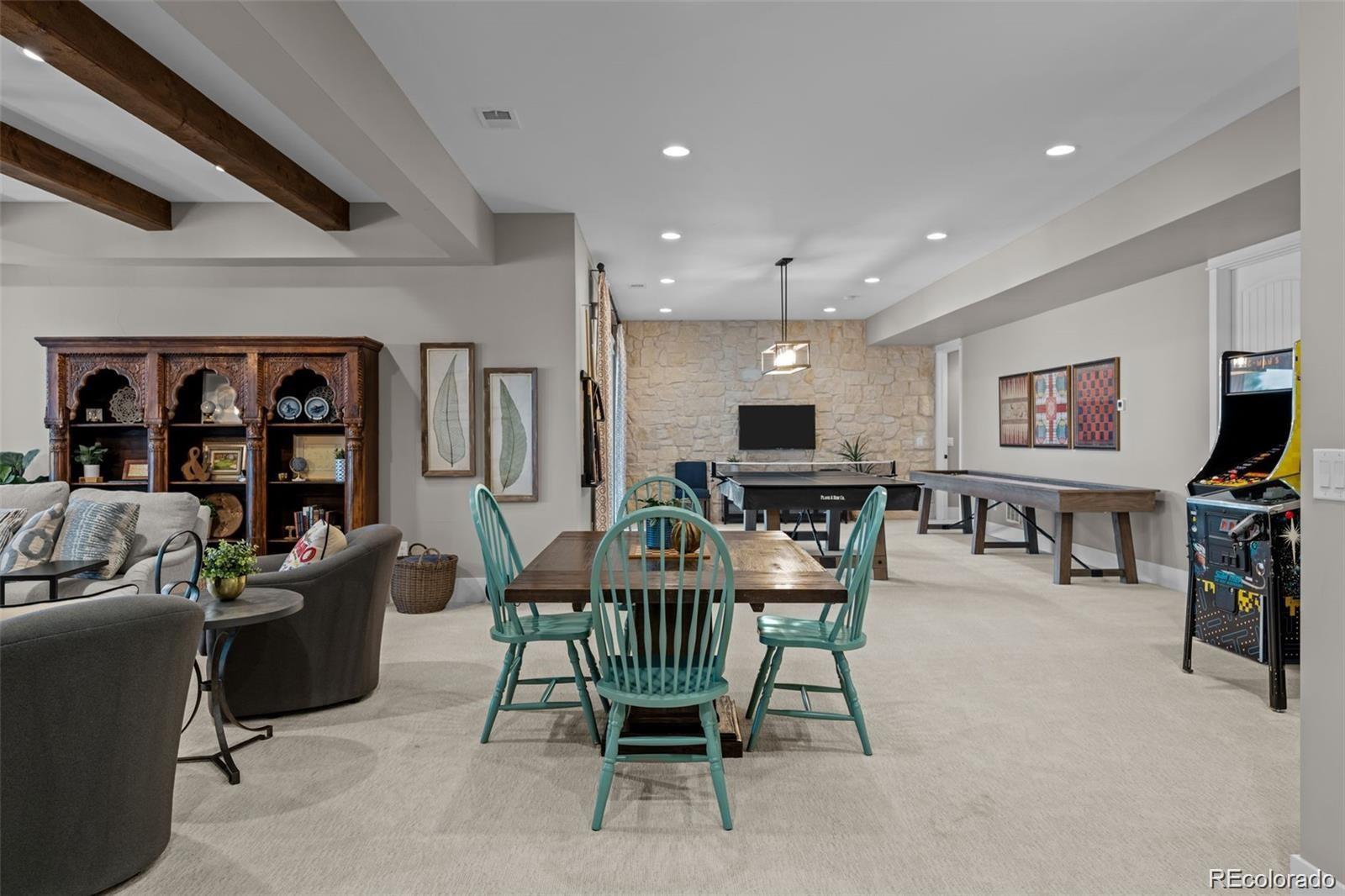 7912 Raphael Lane Littleton, CO 80125 - Photo 30 of 50 a view of a dining room with furniture