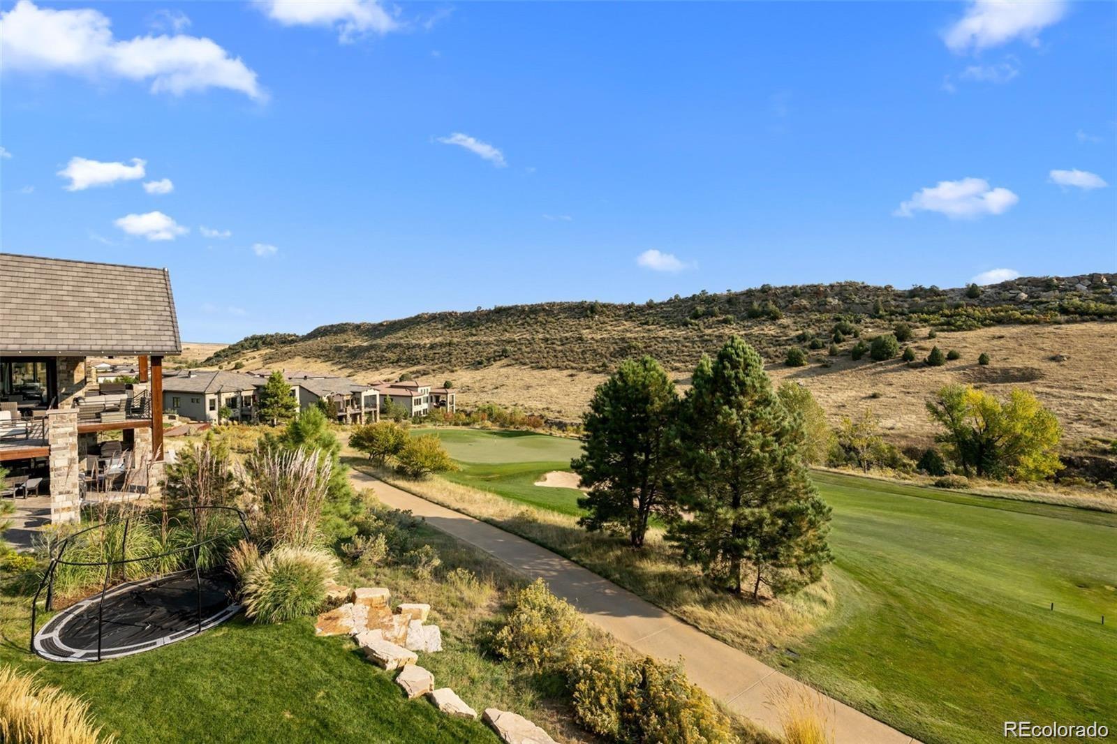 7912 Raphael Lane Littleton, CO 80125 - Photo 46 of 50 a view of lake with mountain