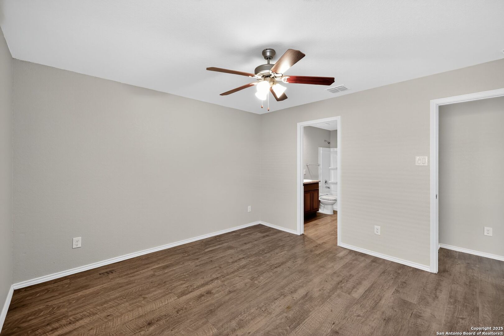3921 Asher Alley St. Hedwig, TX 78152 - Photo 17 of 30 a view of an empty room with wooden floor