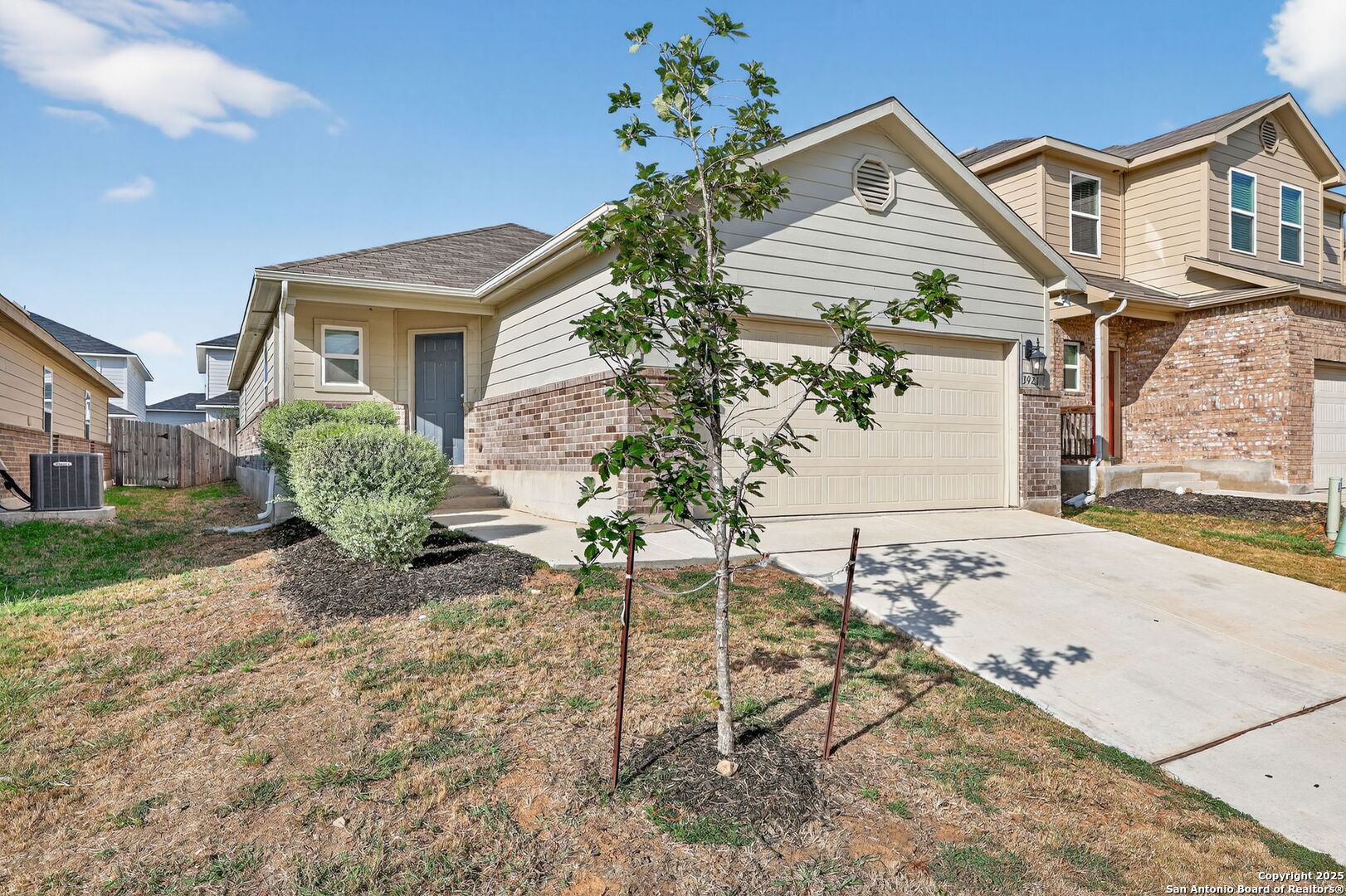 3921 Asher Alley St. Hedwig, TX 78152 - Photo 2 of 30 a front view of a house with a yard