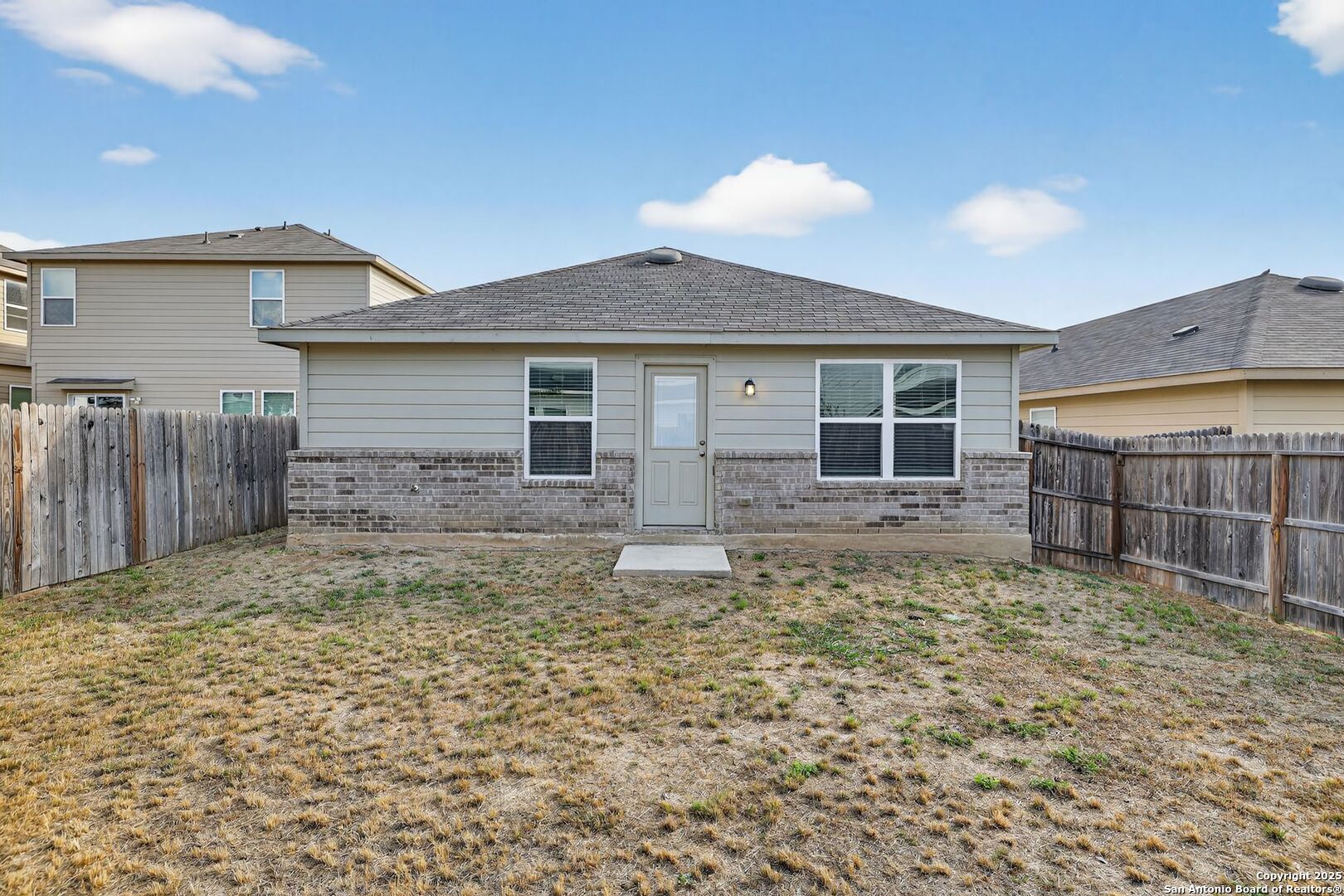 3921 Asher Alley St. Hedwig, TX 78152 - Photo 29 of 30 a view of a house with a yard
