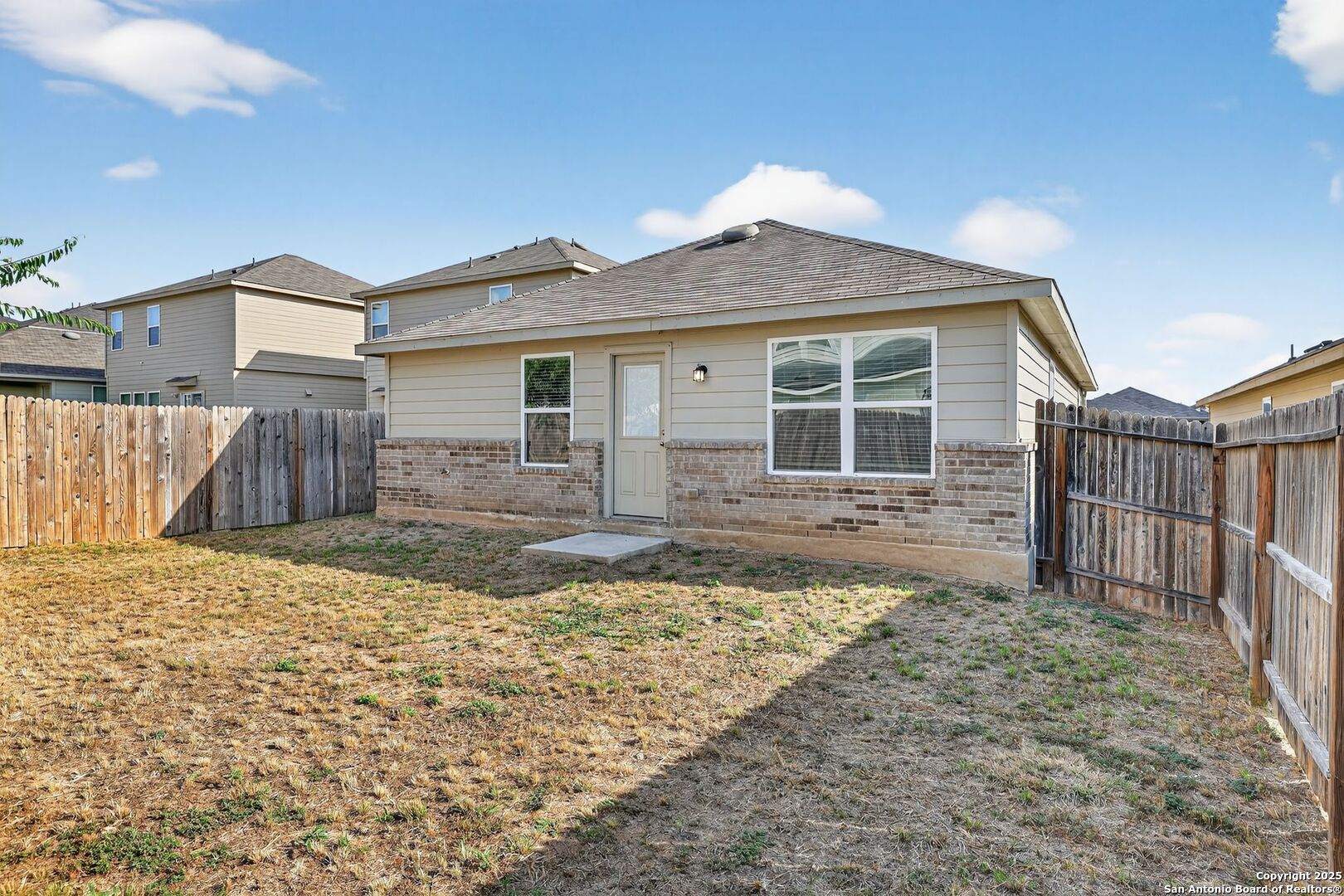 3921 Asher Alley St. Hedwig, TX 78152 - Photo 30 of 30 a front view of a house with a yard