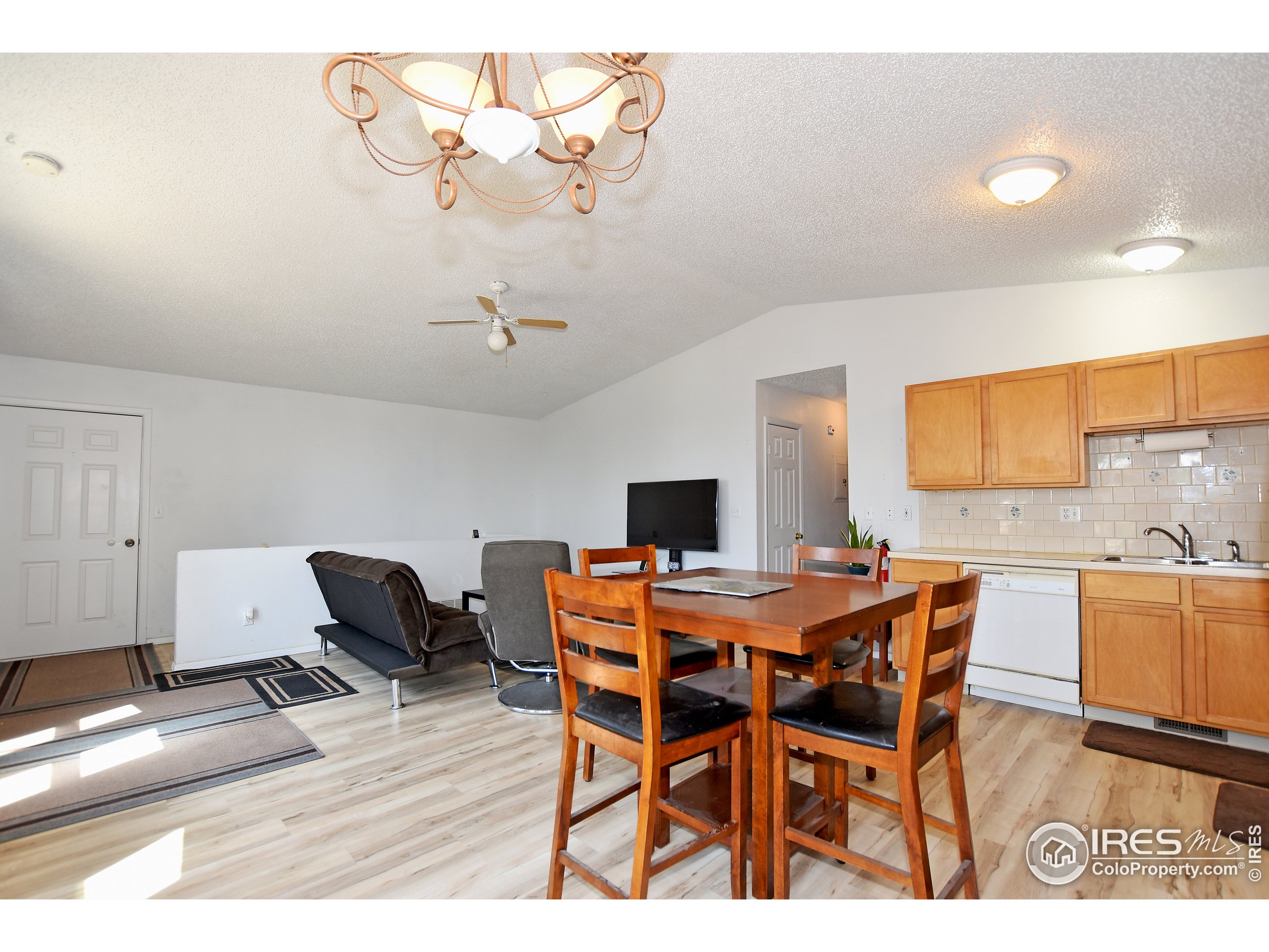207 Cave Avenue Pierce, CO 80650 - Photo 11 of 35 a dining room with furniture and window
