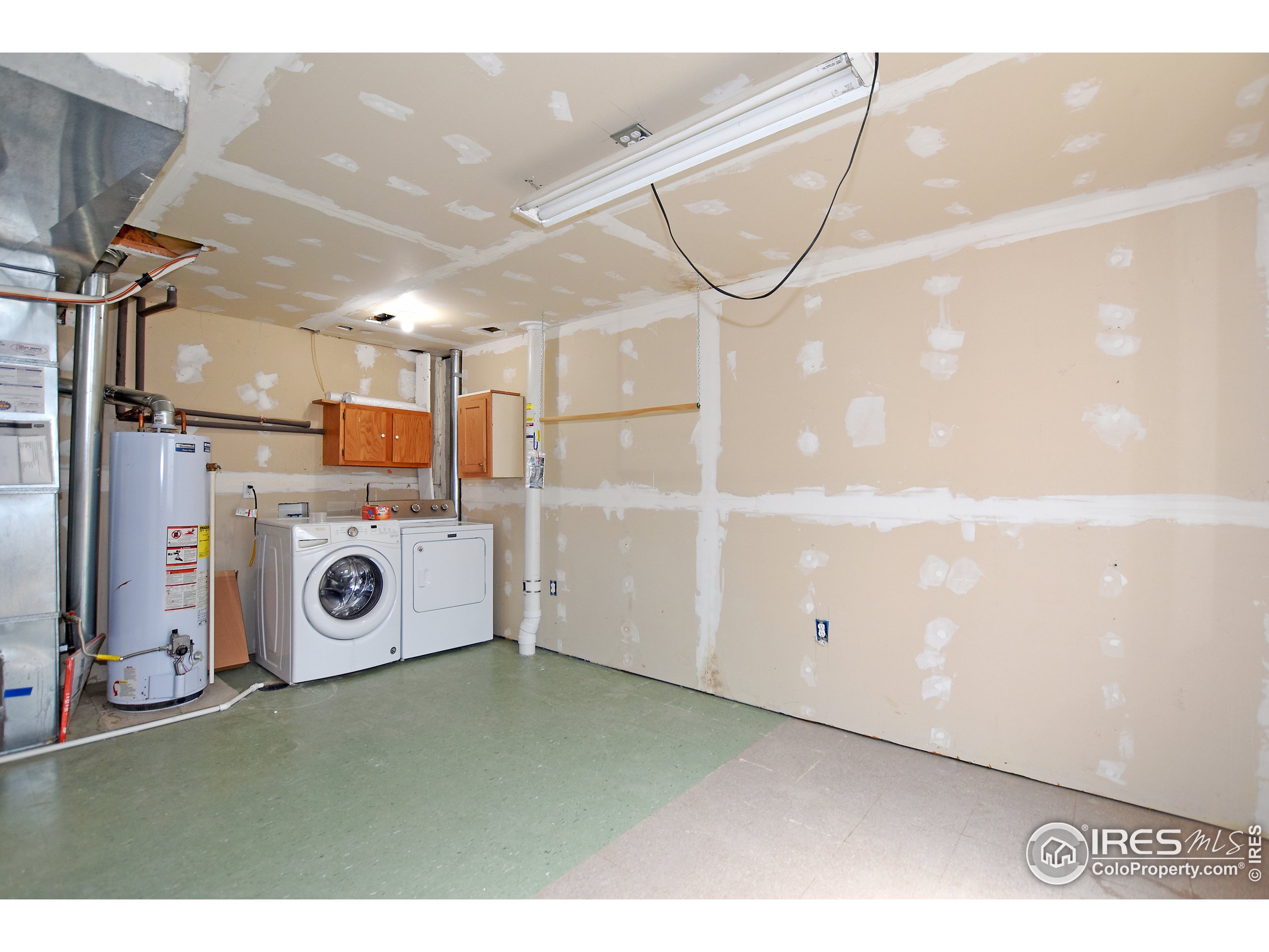 207 Cave Avenue Pierce, CO 80650 - Photo 27 of 35 a utility room with dryer and washer